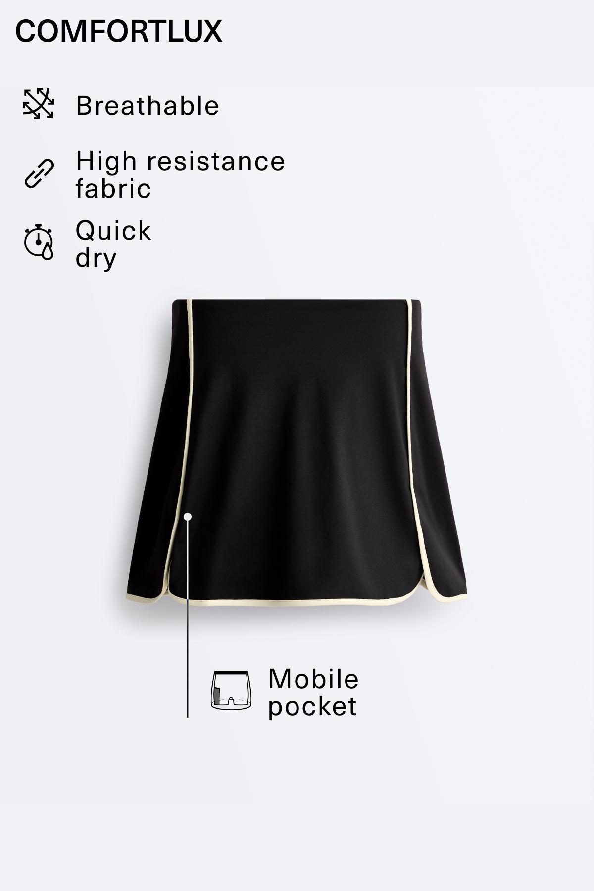 Comfortlux short skirt with contrast piping — BLACK