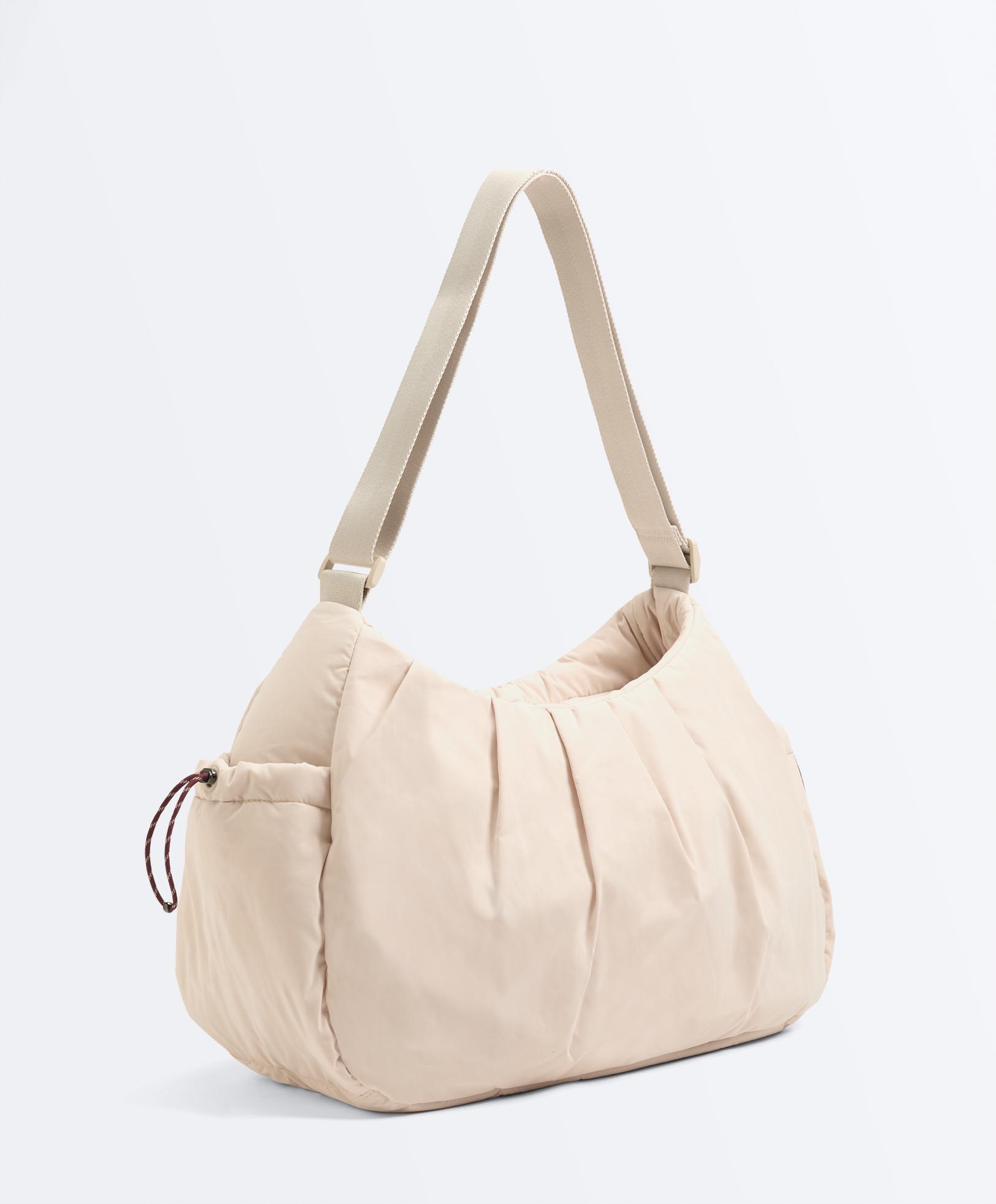 حقيبة تسوق بجيوب جانبية