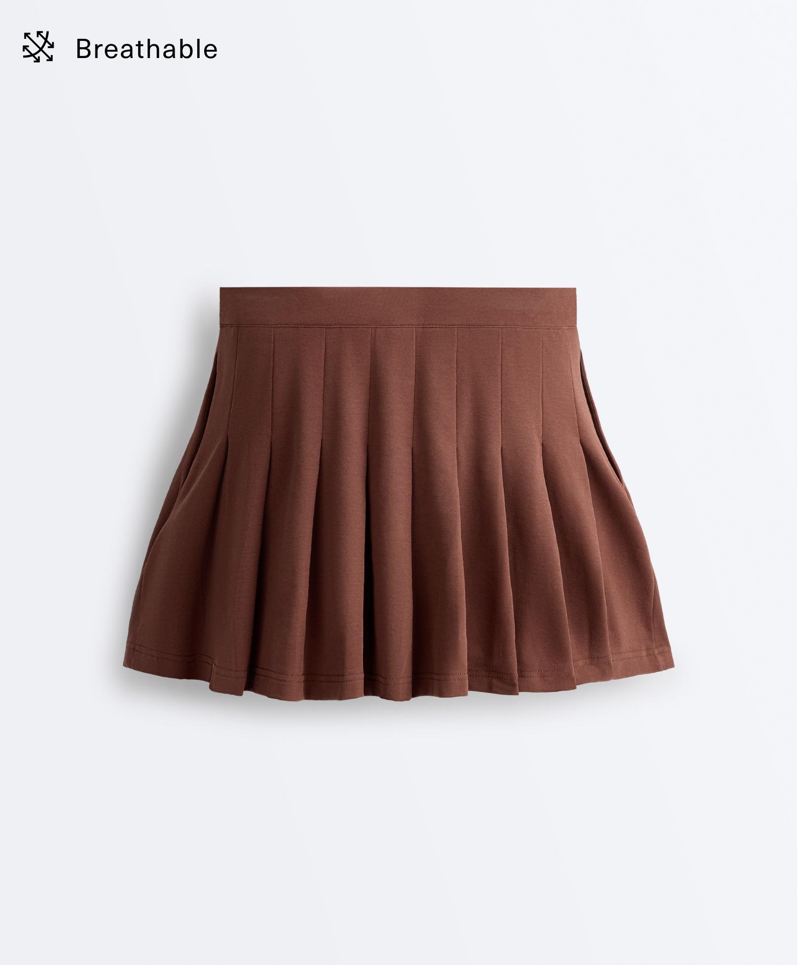 Falda corta piqué con algodón pliegues Falda corta piqué con algodón pliegues