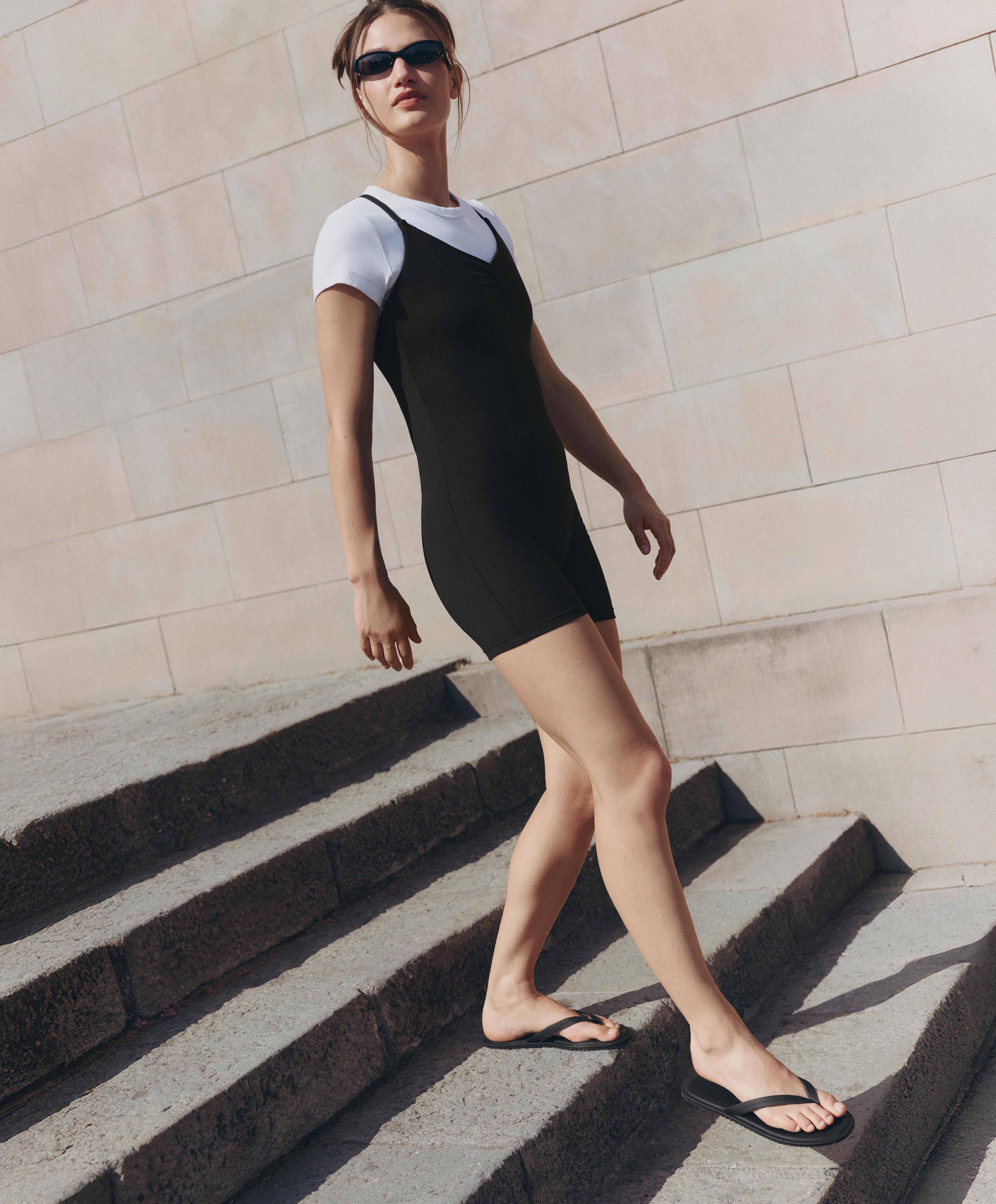 Comfortlux short jumpsuit with knot detail — BLACK