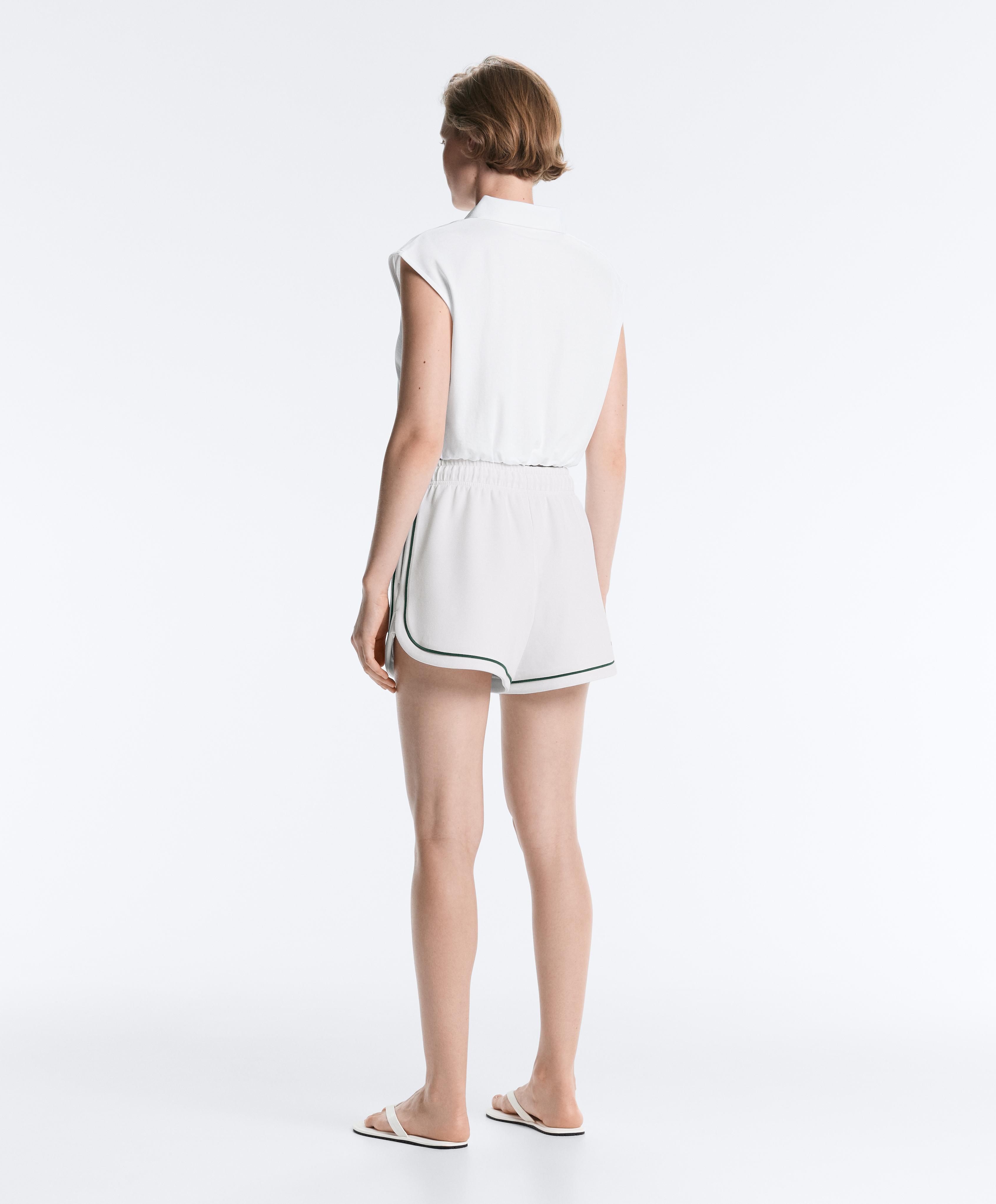 Sleeveless piqué cotton polo shirt — WHITE
