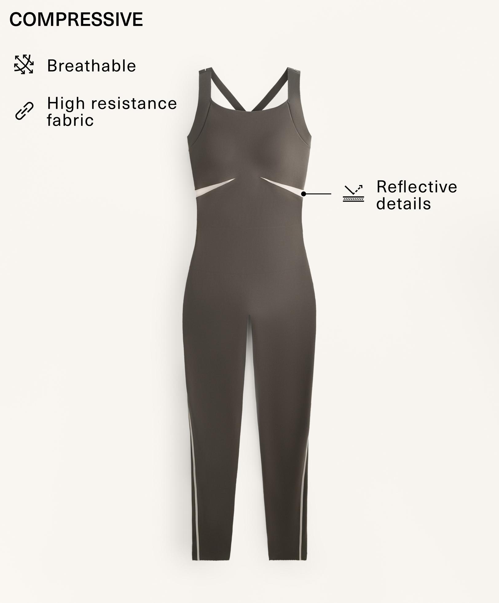 Compressive reflective jumpsuit