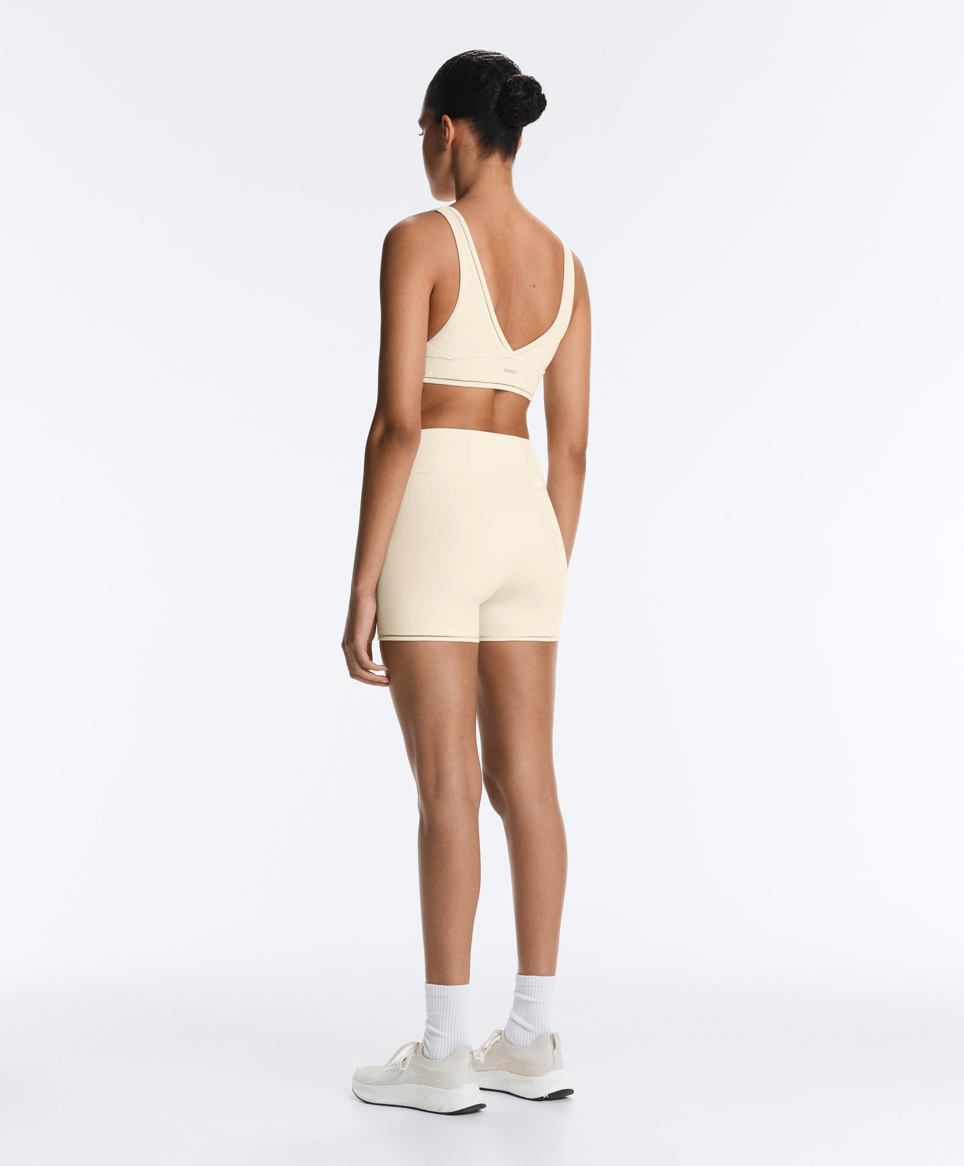 Comfortlux medium-support hemstitch sports bra — ECRU