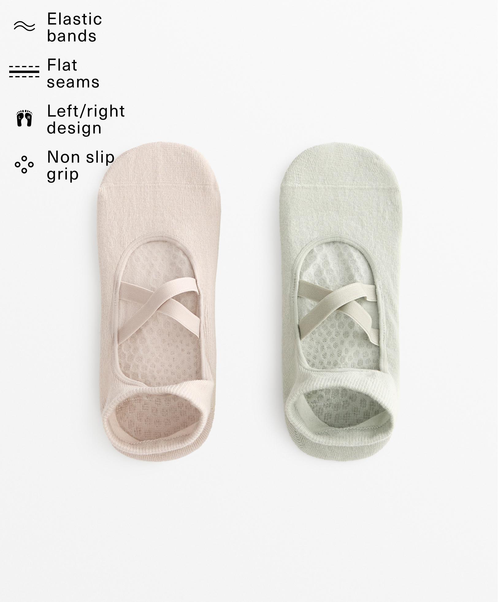 2 pairs of cotton blend yoga and Pilates socks with crossover straps