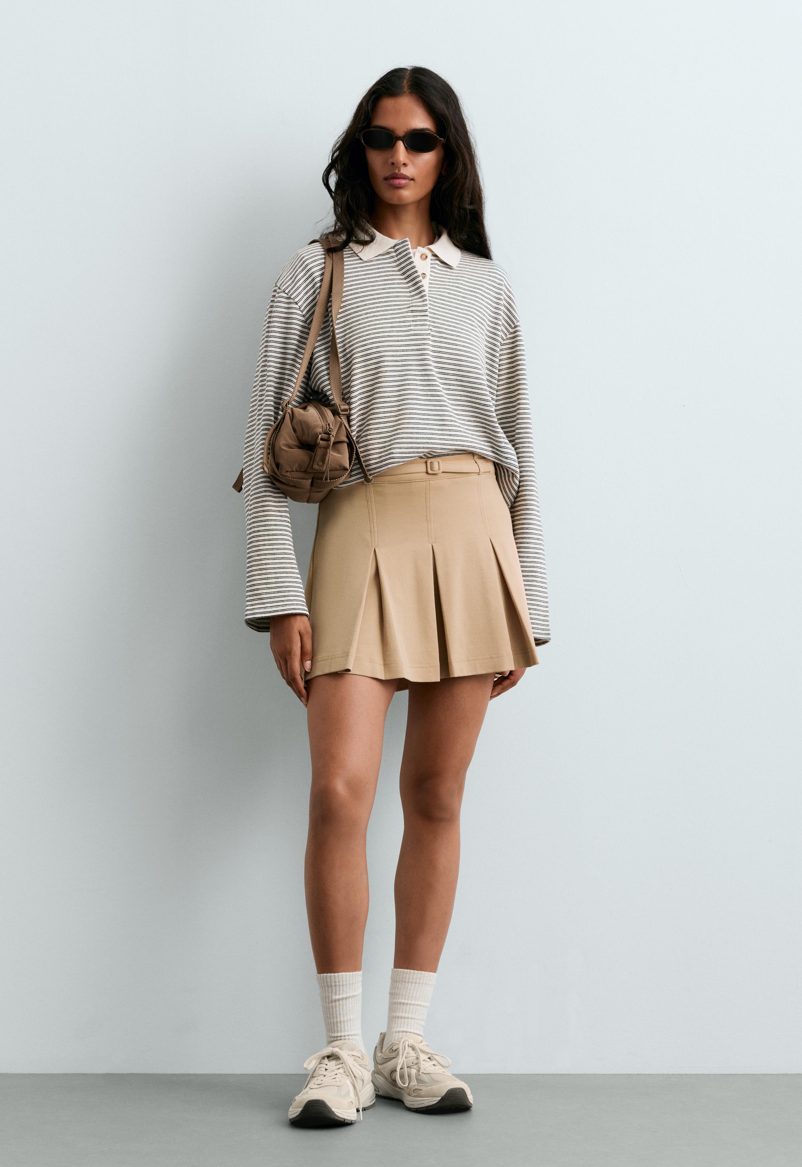 High-rise pleated short skirt with belt High-rise pleated short skirt with belt