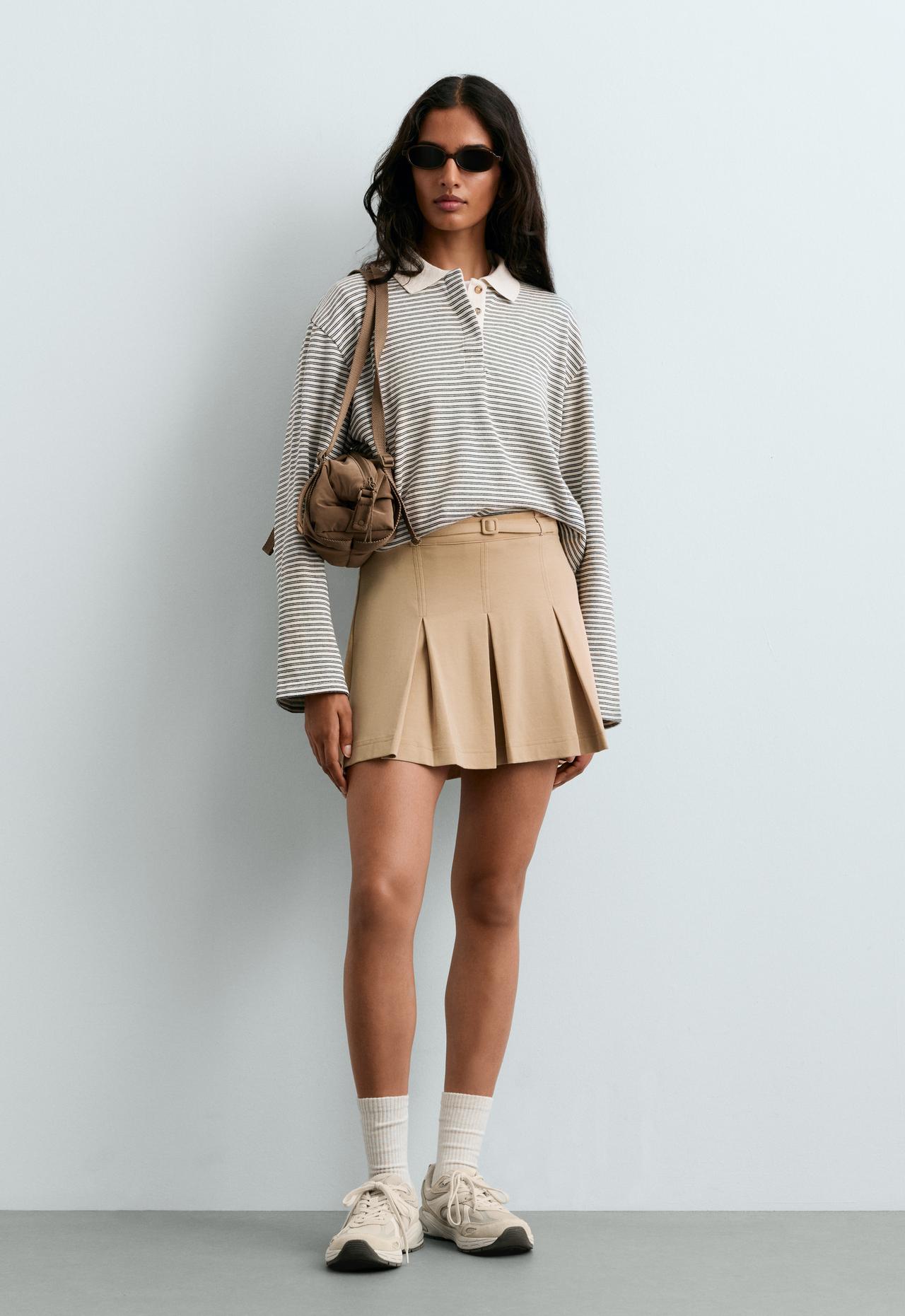 High-rise pleated short skirt with belt — BEIGE