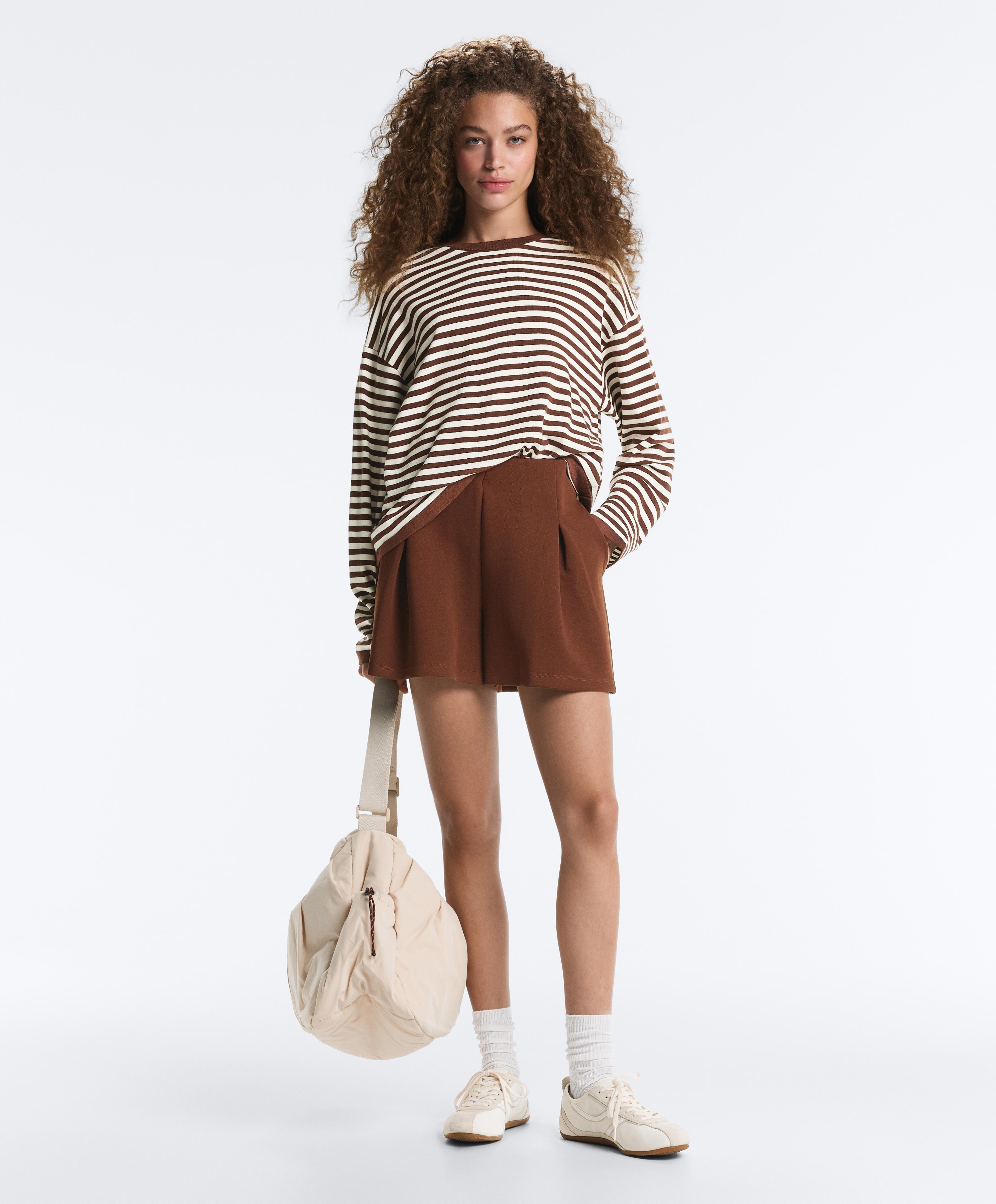 Short pliegues delanteros piqué