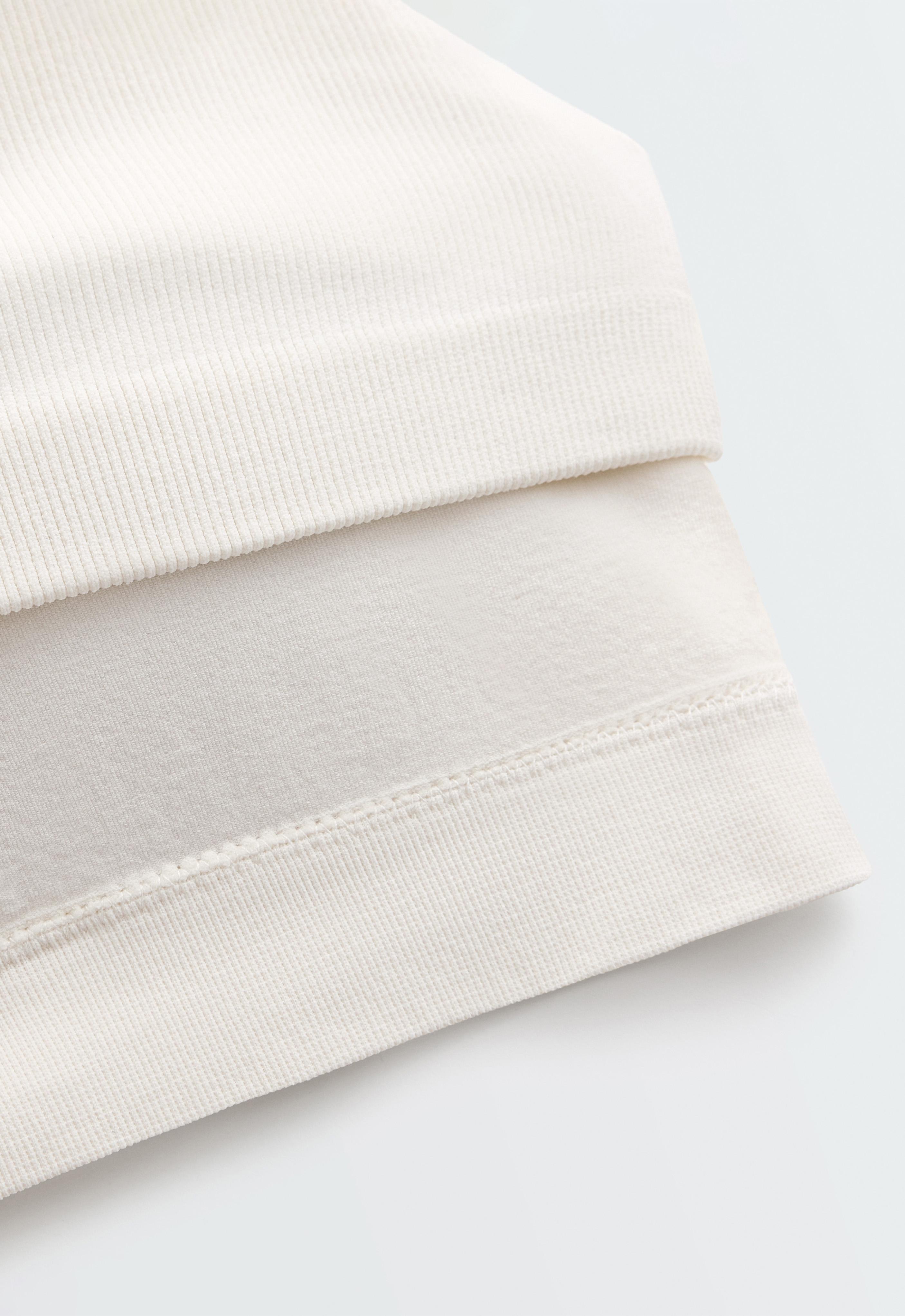 Sleeveless seamless half-zip tank top — PALE ECRU