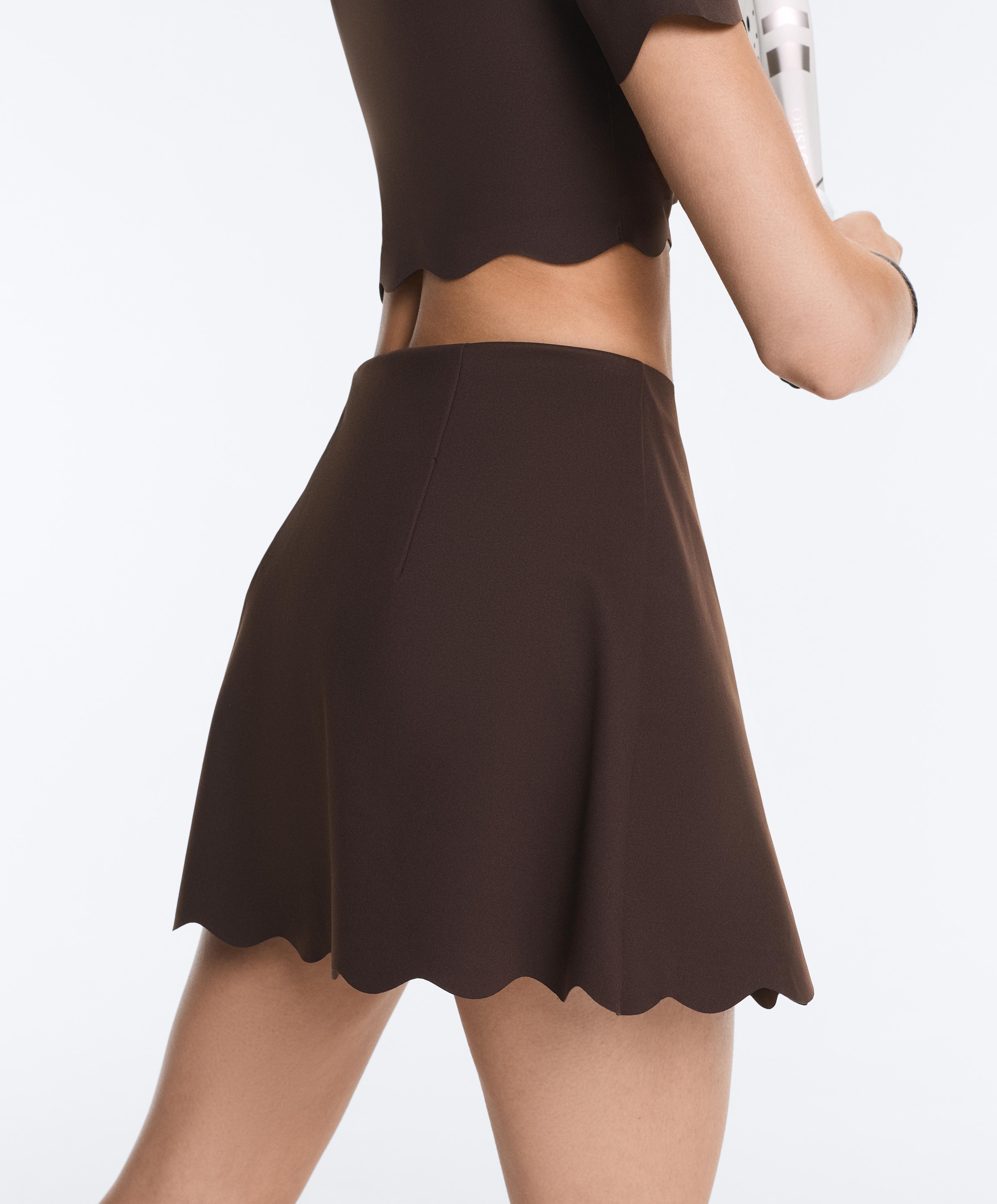 Compressive high-rise wavy short skirt — DARK REDDISH‑BROWN