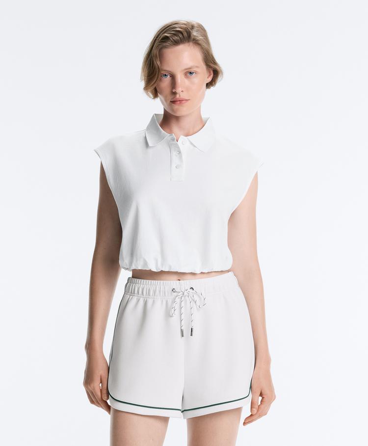 Sleeveless piqué cotton polo shirt — WHITE