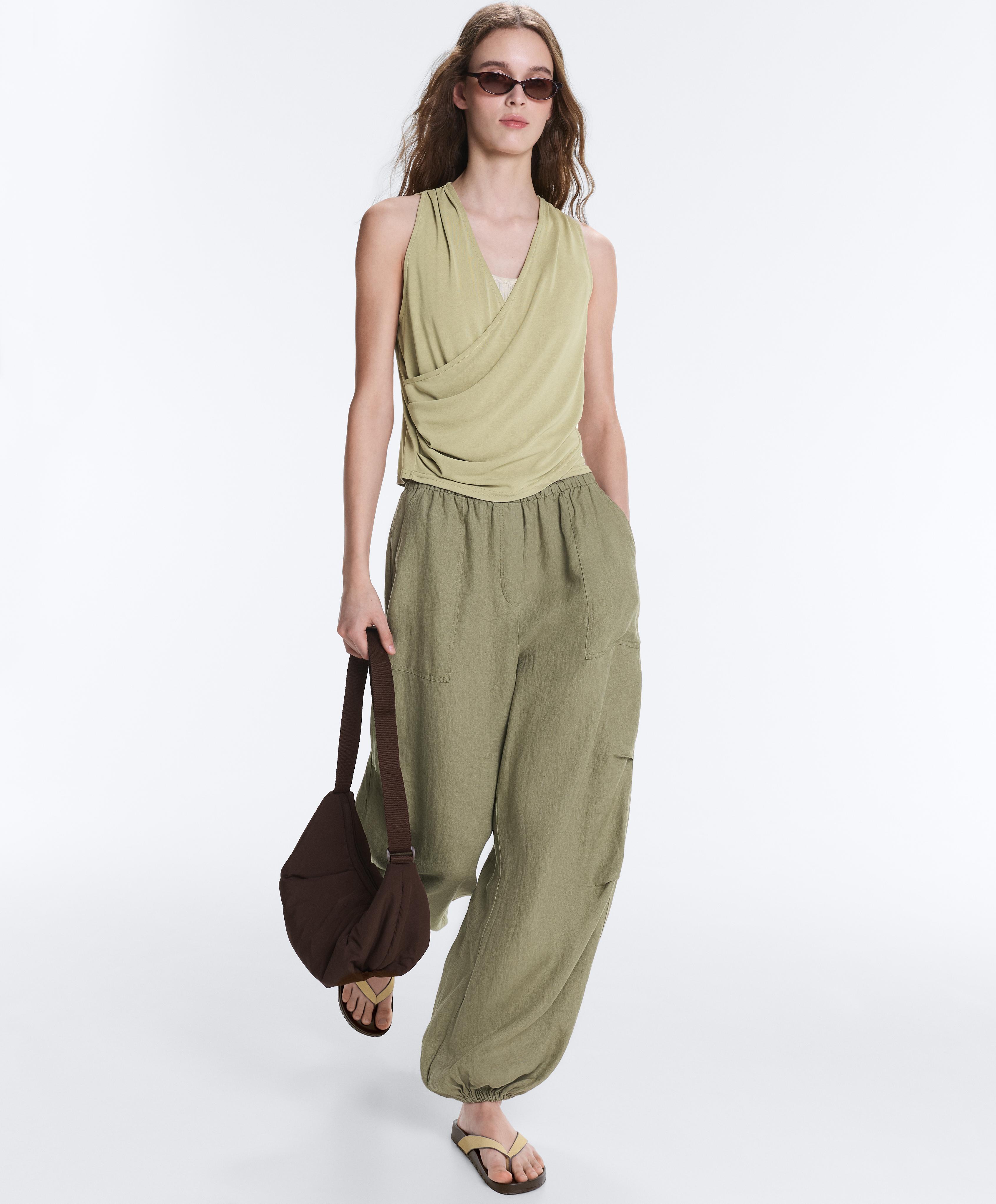 Modal blend sleeveless crossover T-shirt — PALE PISTACHIO