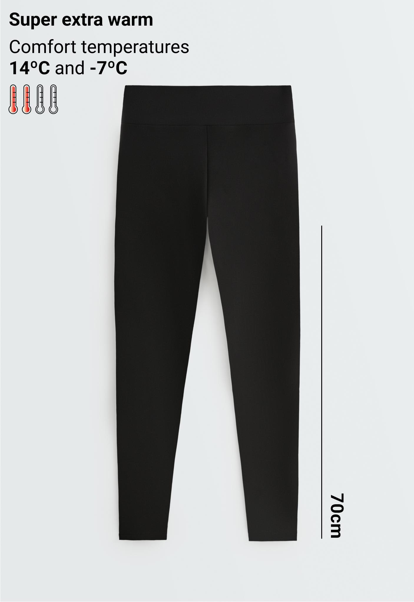 Front view of black ankle-length, high-waisted leggings.