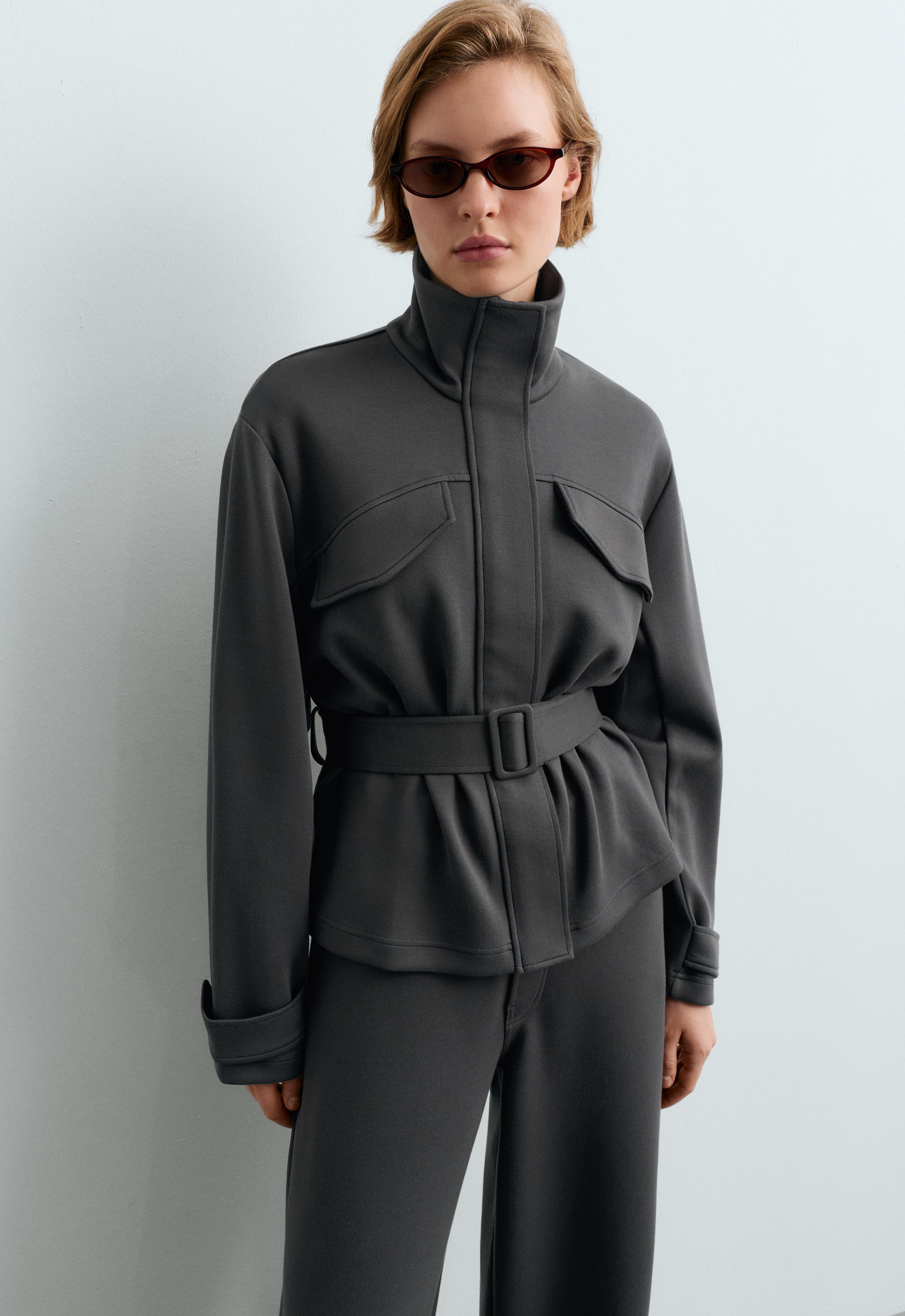 Chaqueta bolsillos cinturón