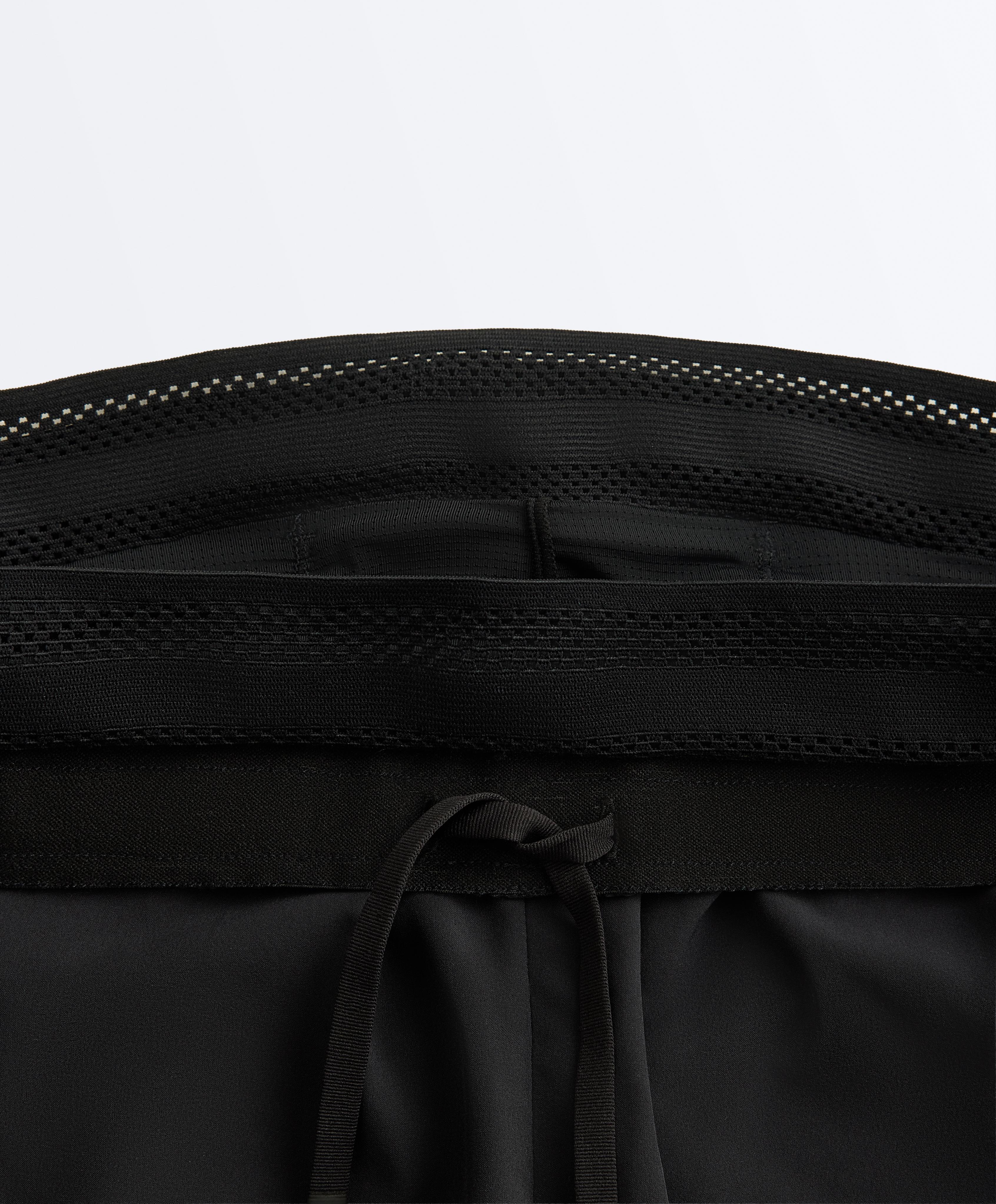 Mid rise 2-in-1 technical shorts — BLACK