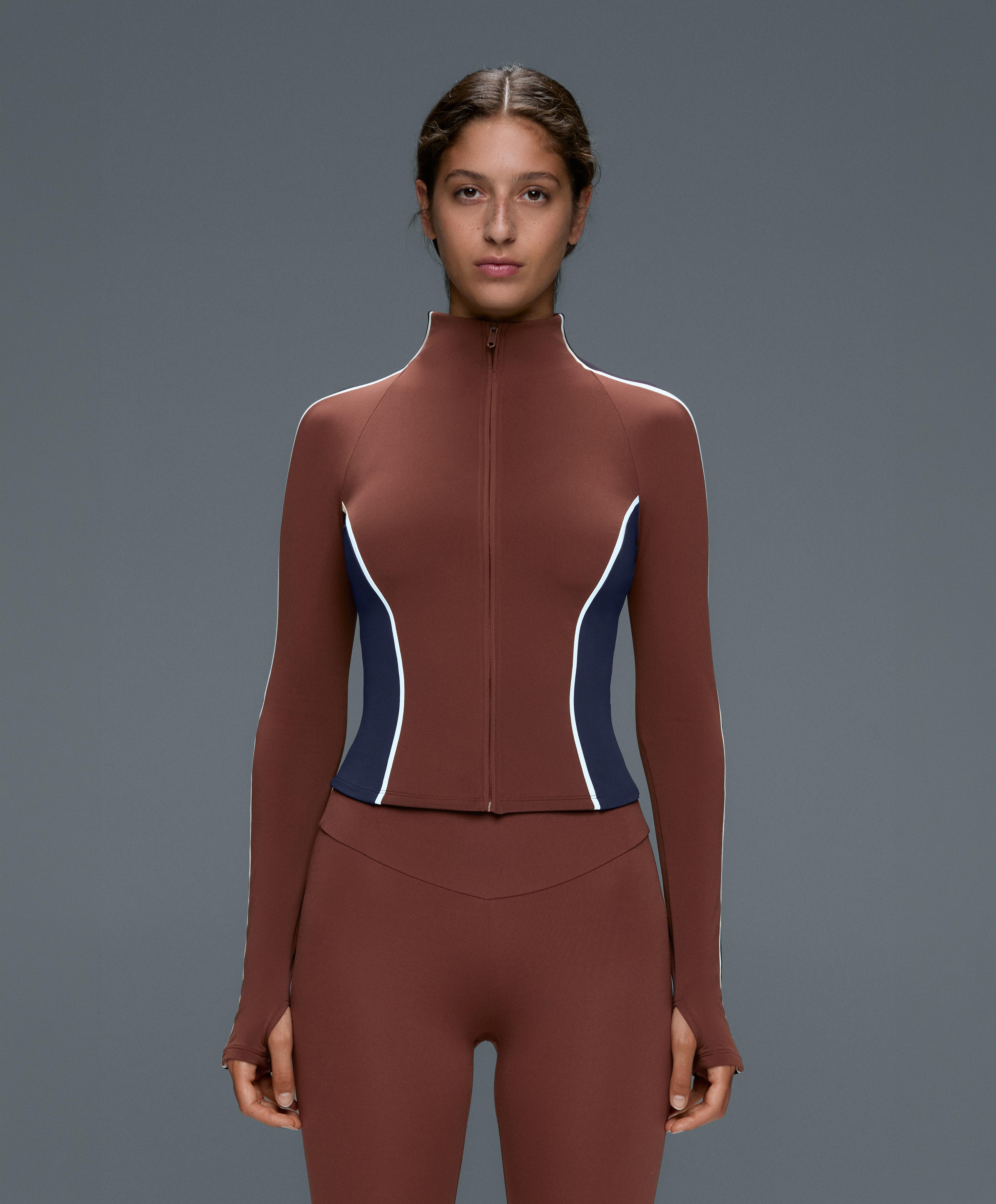 Light warm colour-block technical jacket — TERRACOTTA
