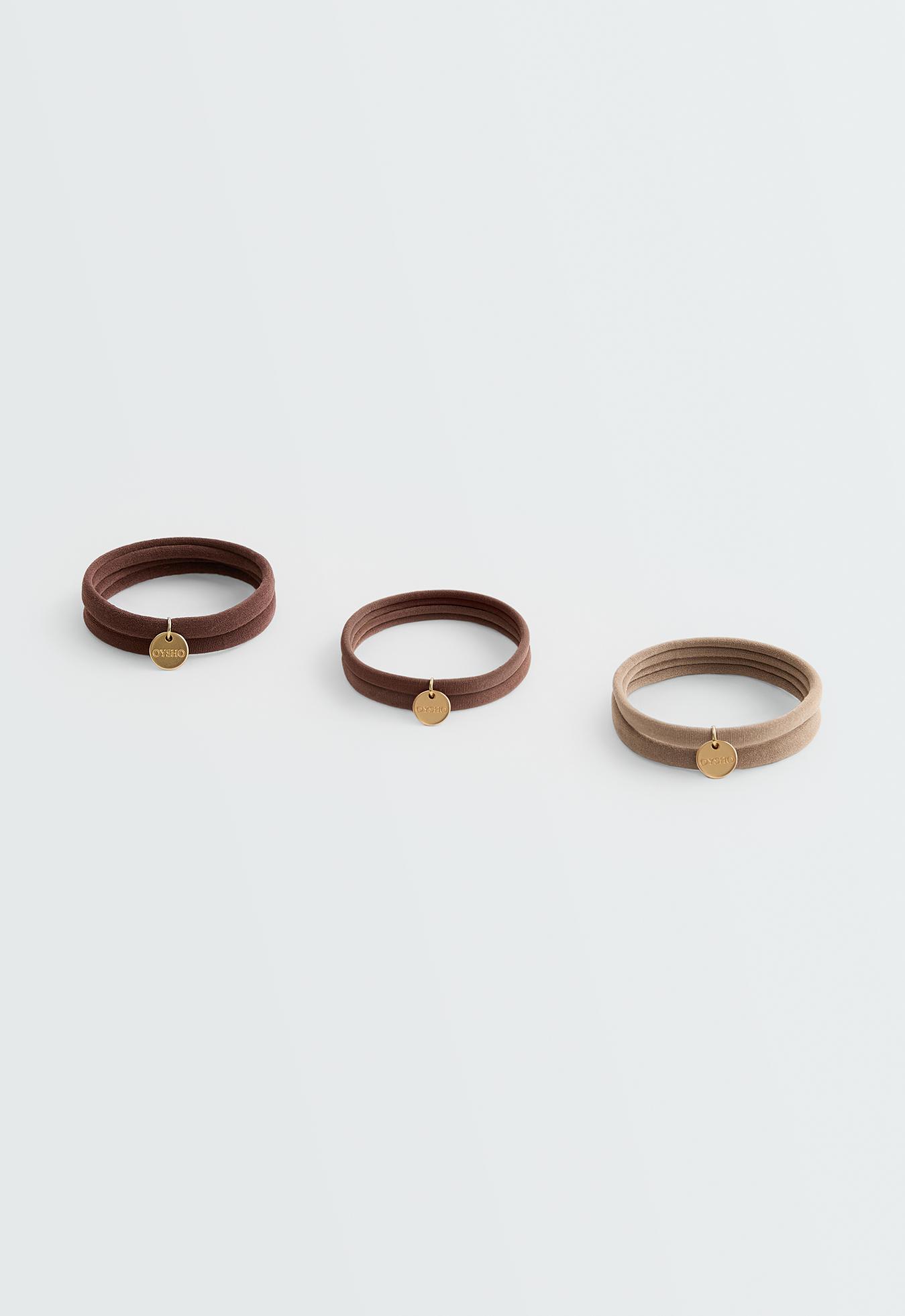 6 Oysho plaque hair ties — TAN