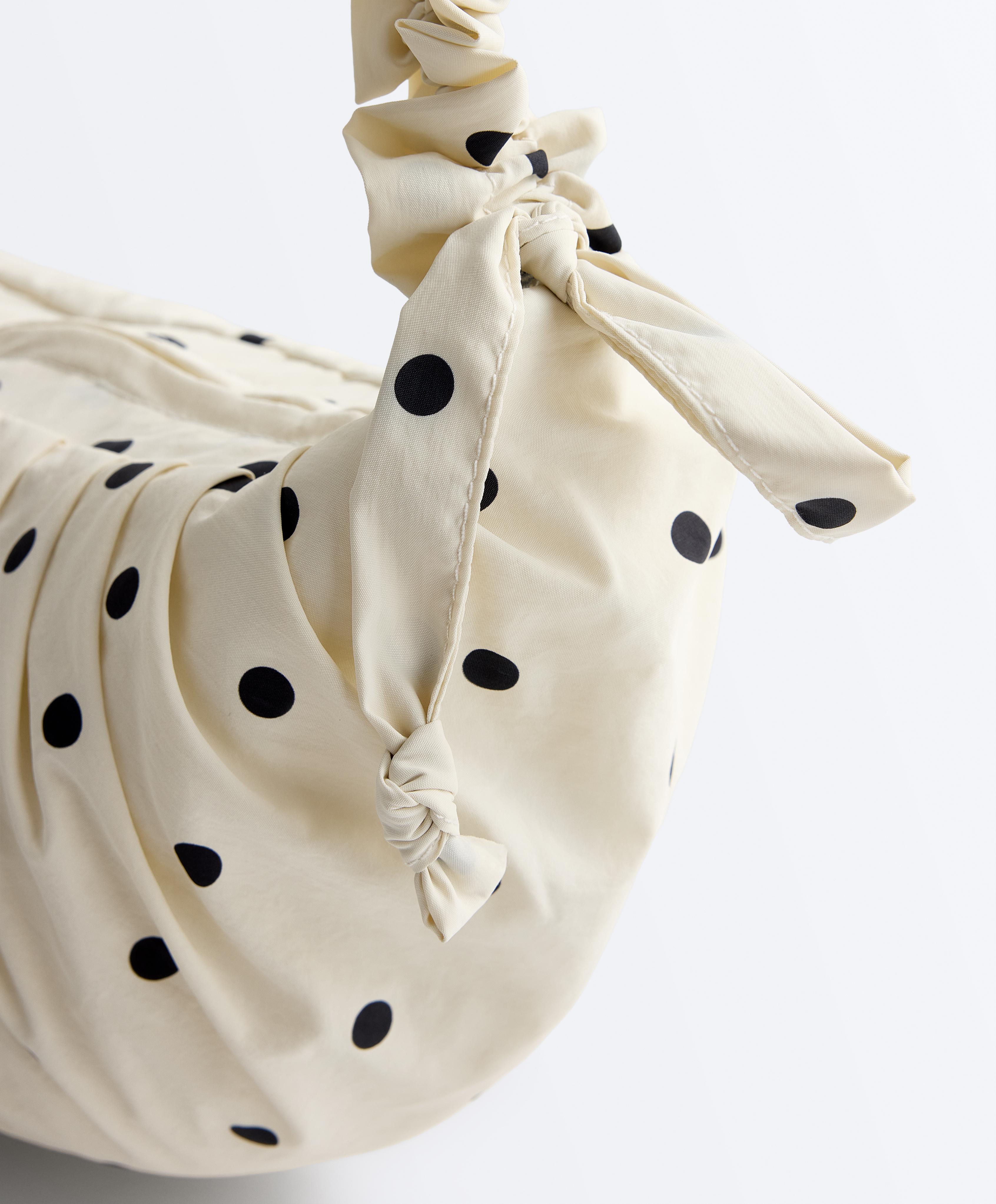 Bolso bandolera estampado topos