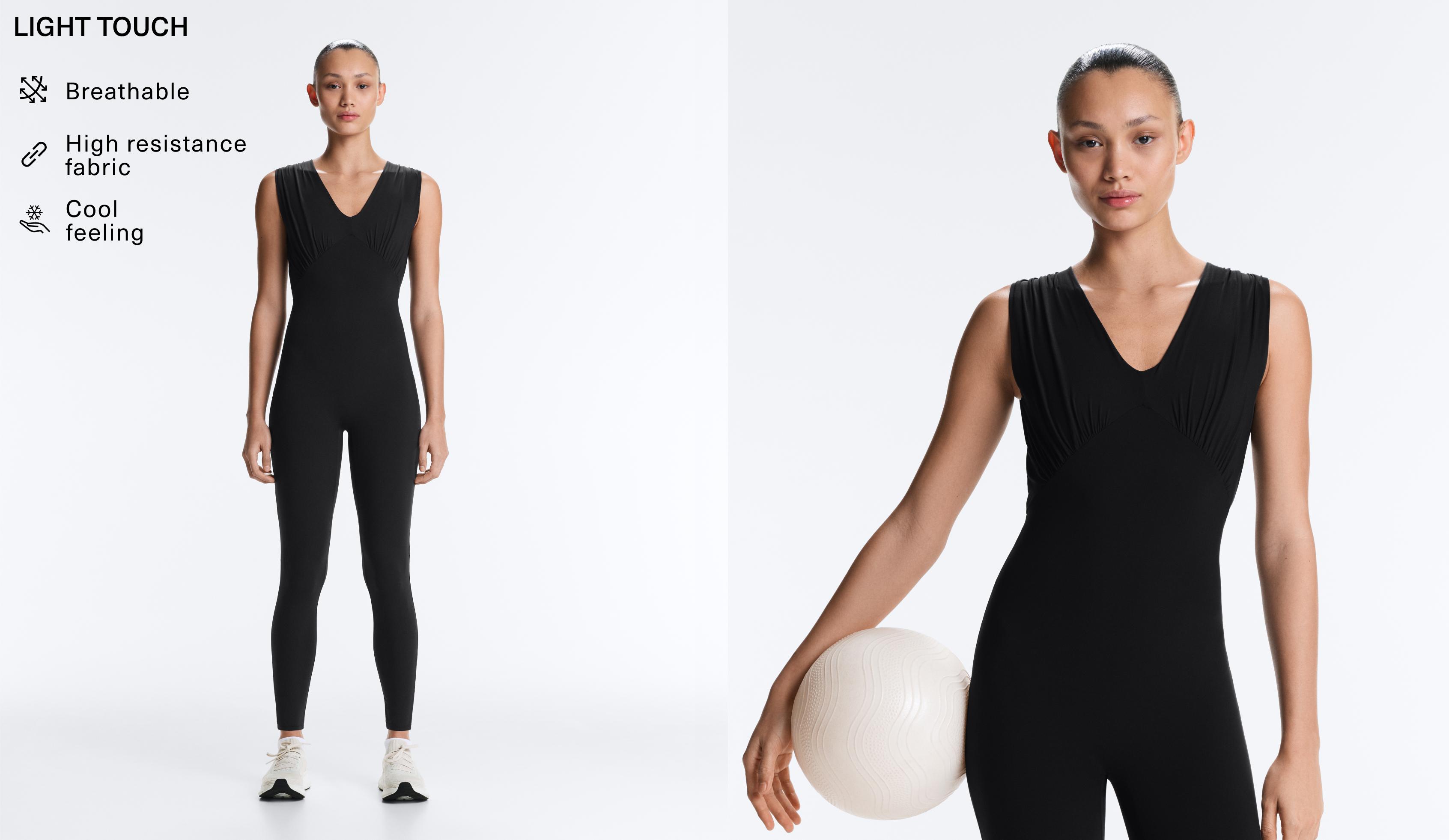 Light Touch V-neck jumpsuit — BLACK