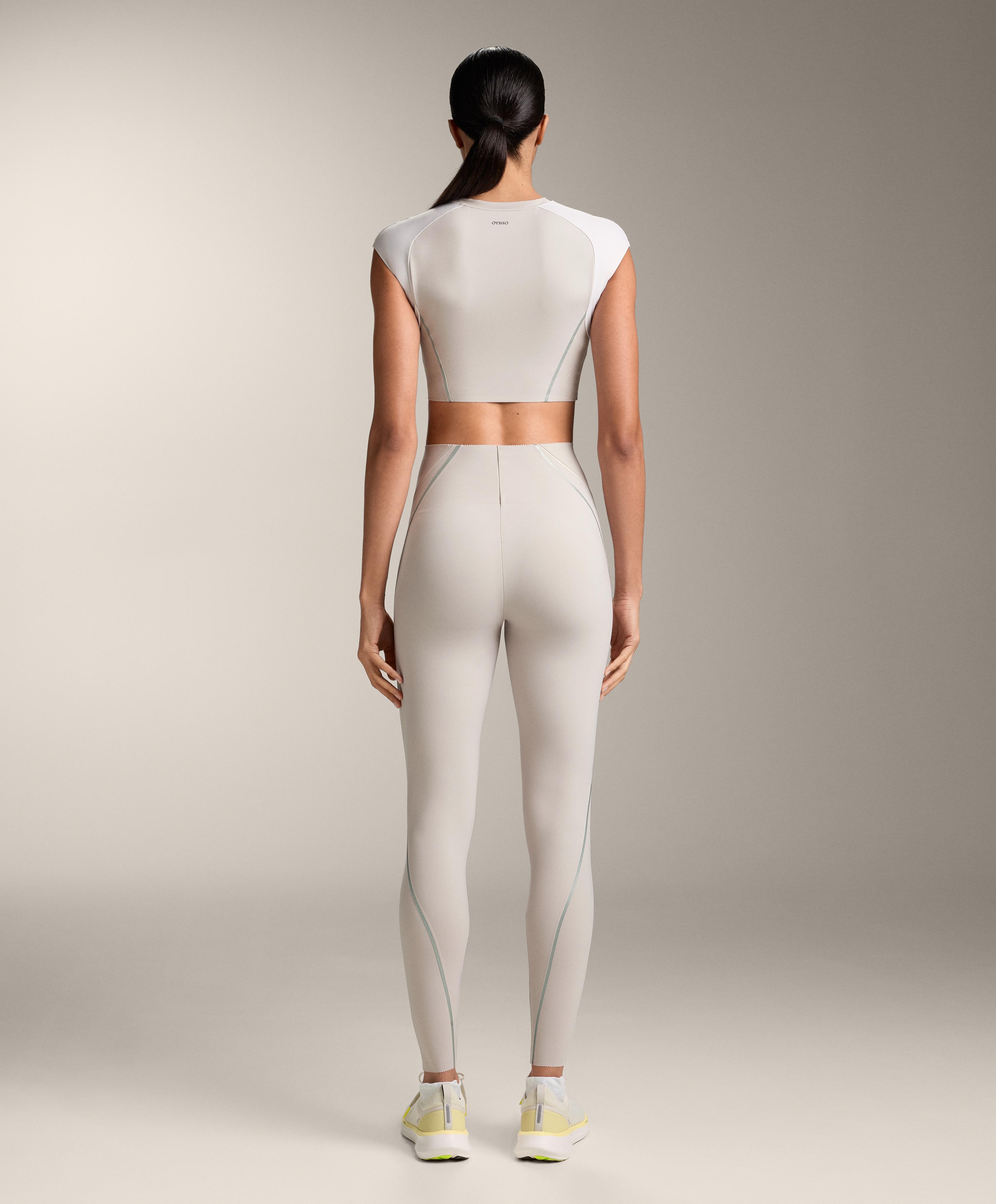 High-rise Compressive reflective core control ankle-length leggings — TAUPE