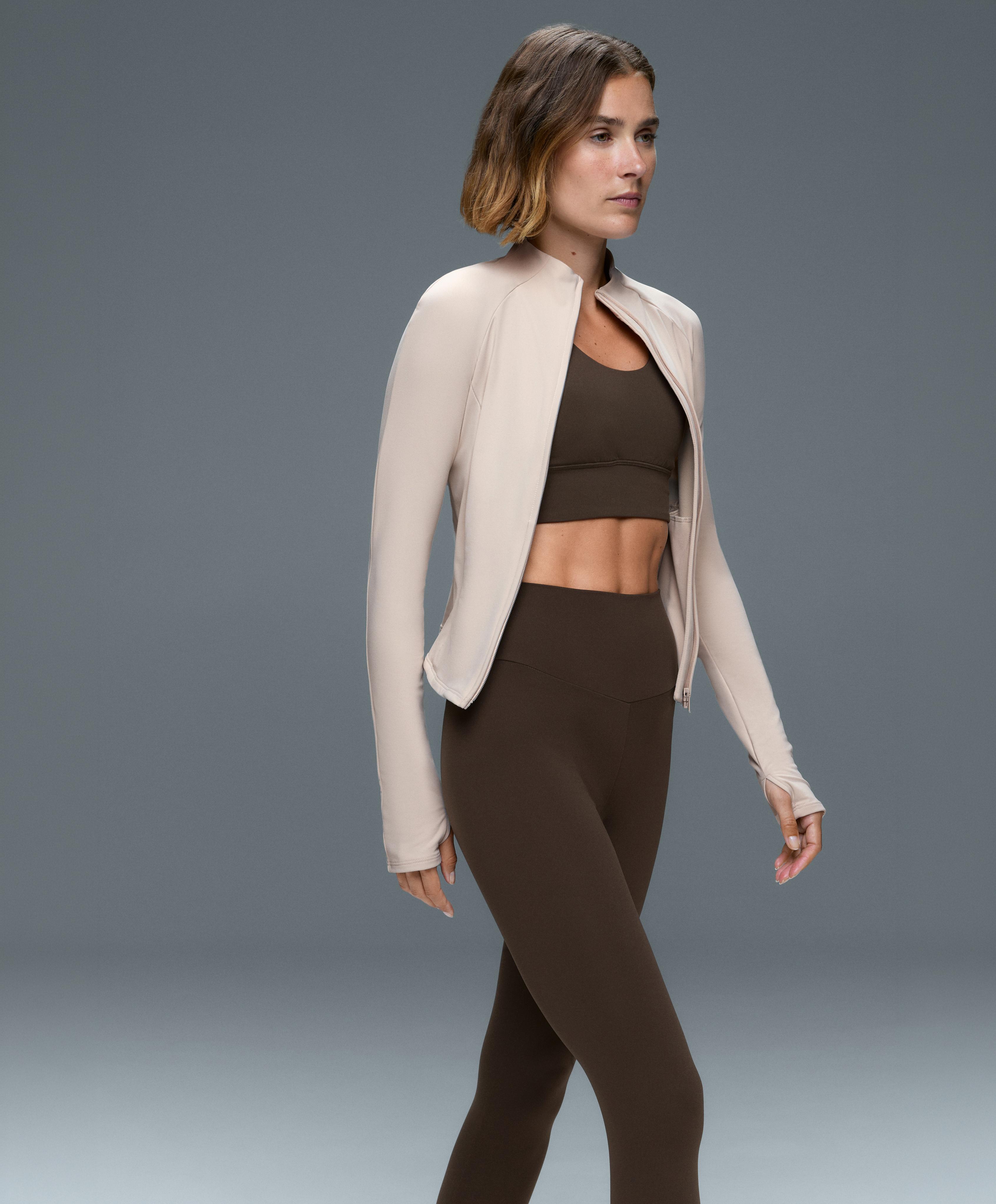Short light warm technical jacket — PALE MINK