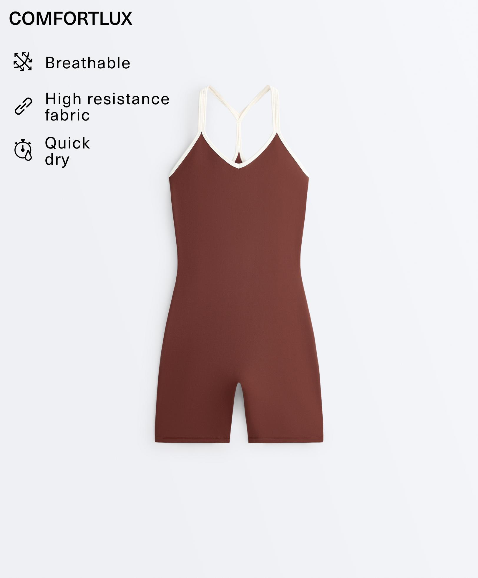 Comfortlux short jumpsuit with contrast double straps Comfortlux short jumpsuit with contrast double straps