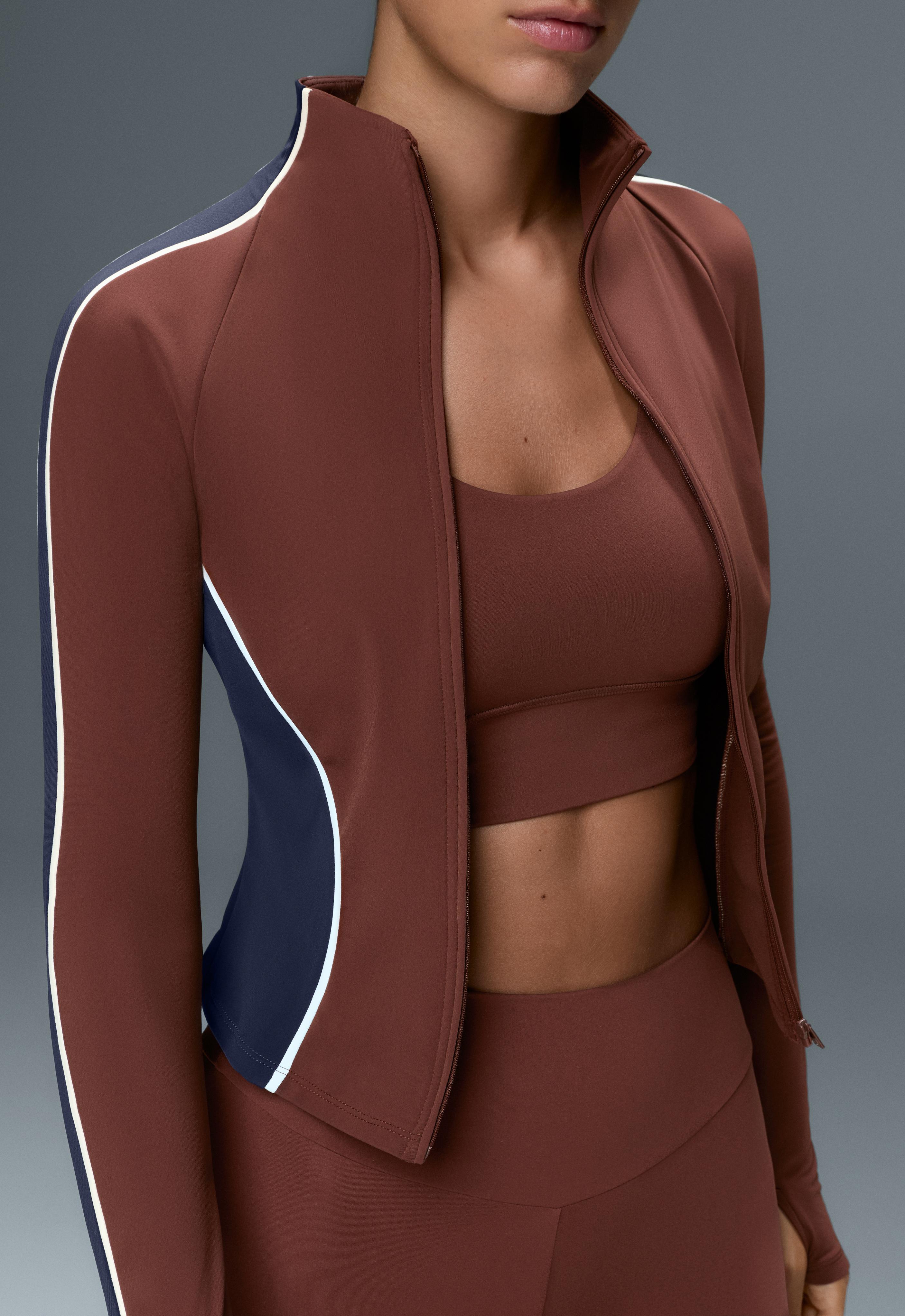 Light warm colour-block technical jacket — TERRACOTTA