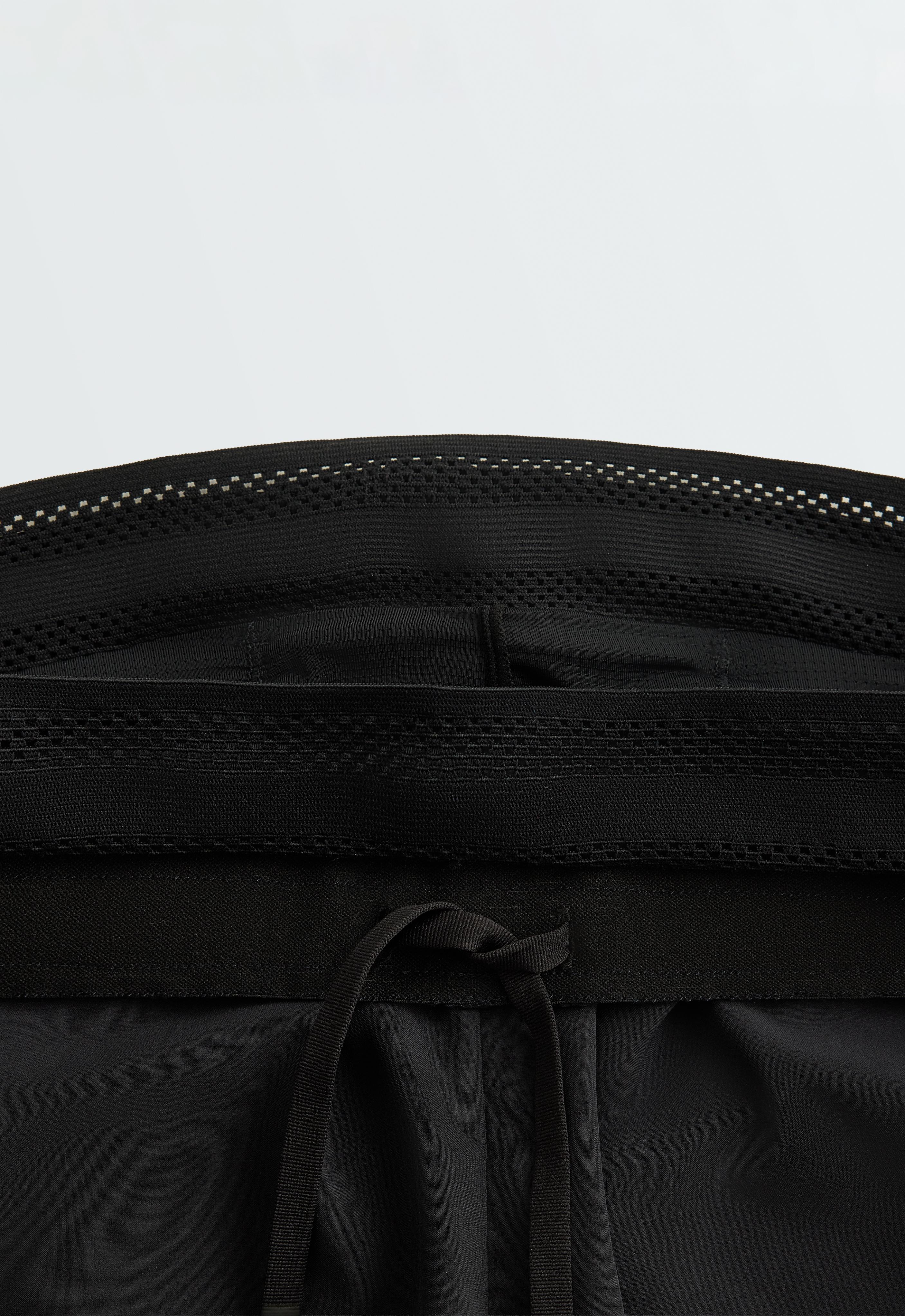 Technical mid rise 2-in-1 shorts — BLACK