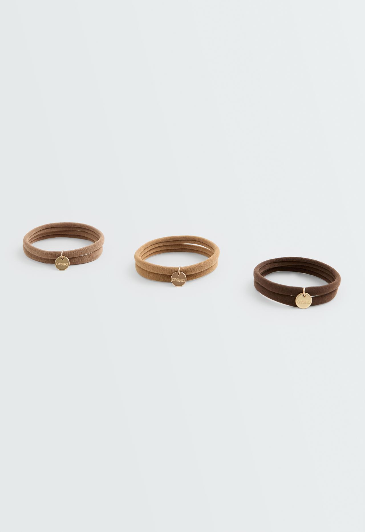 6 Oysho plaque hair ties — ACID