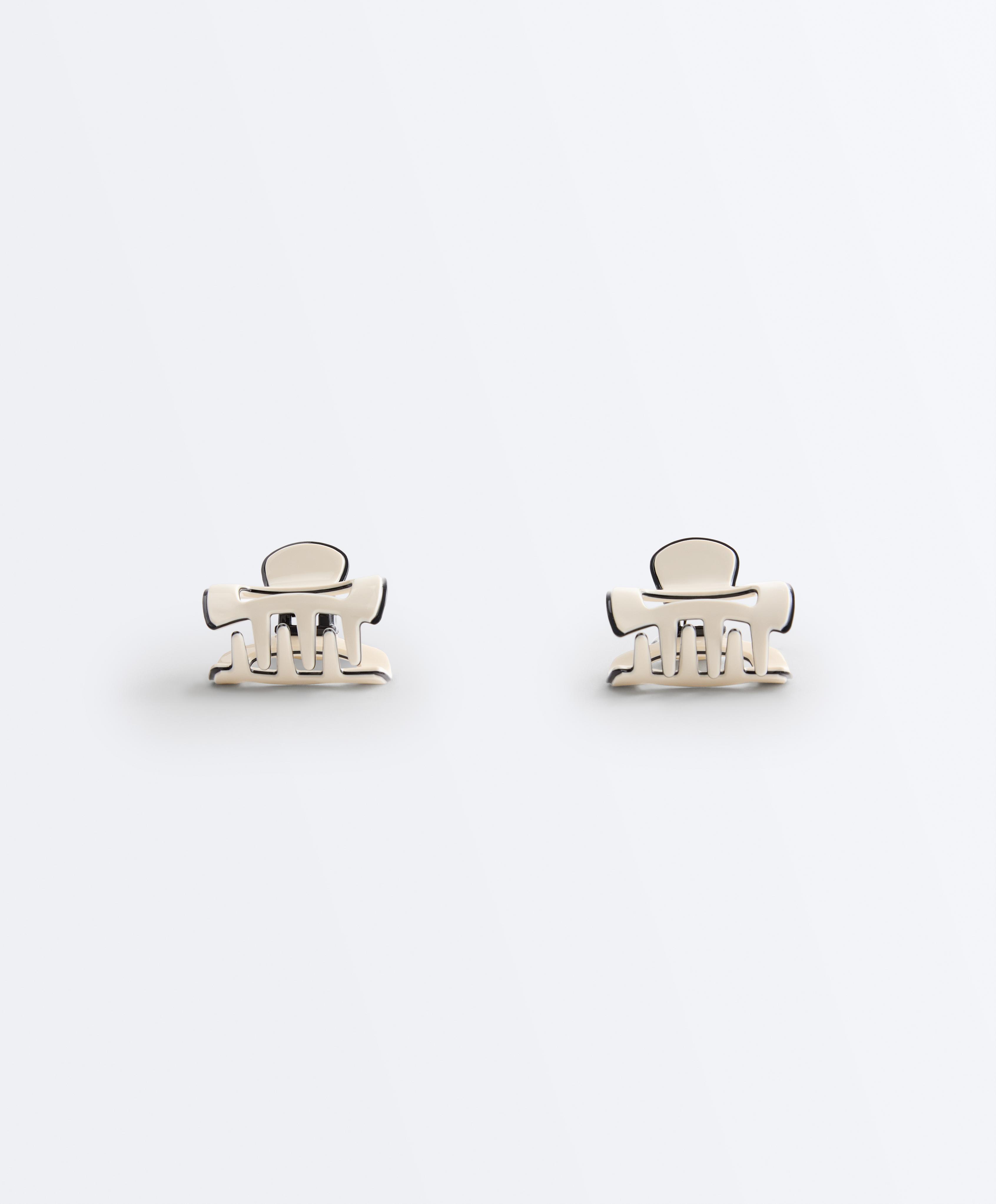 2 mini hair clips with piping