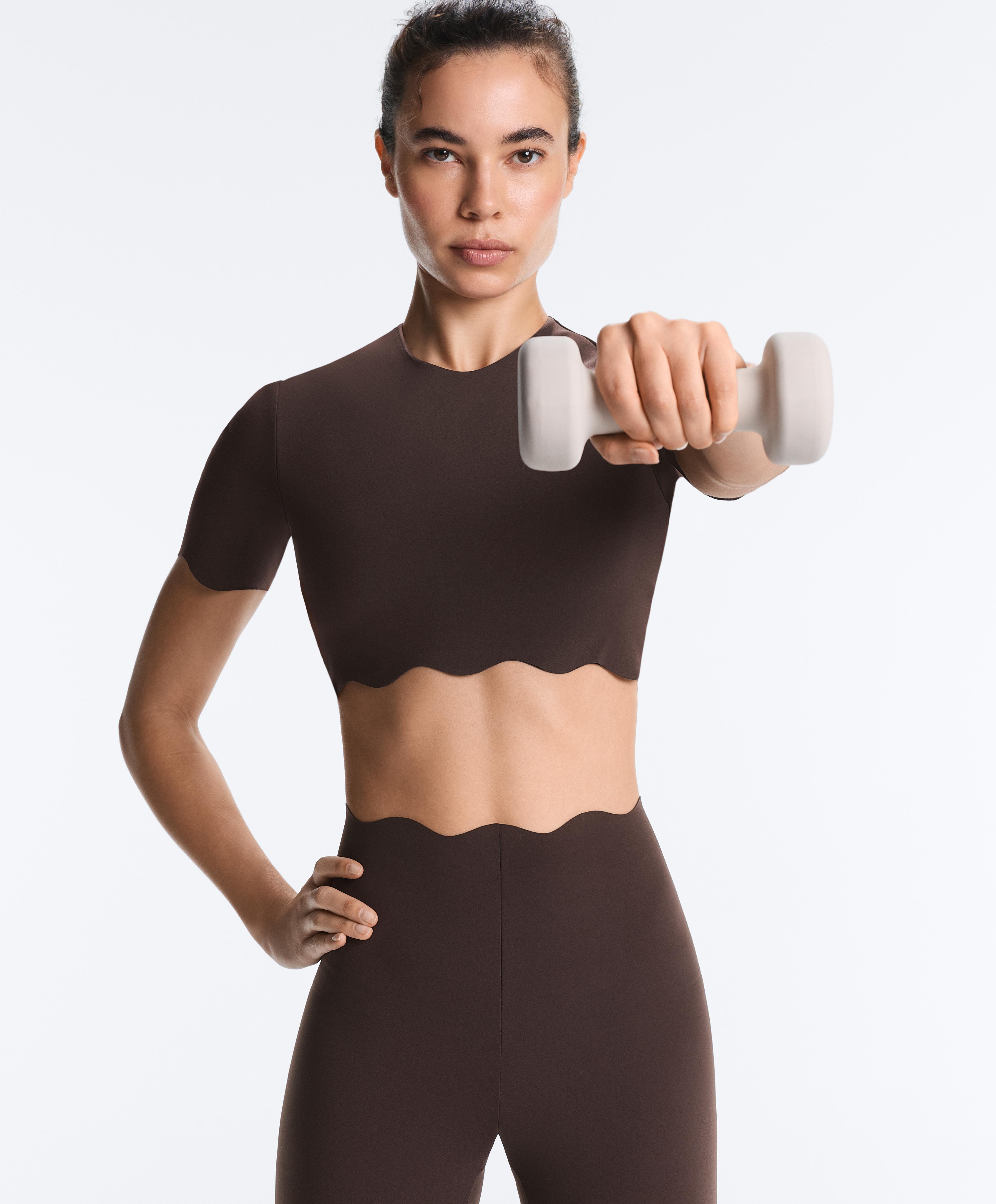 High-rise compressive core control ankle-length leggings with wave detail