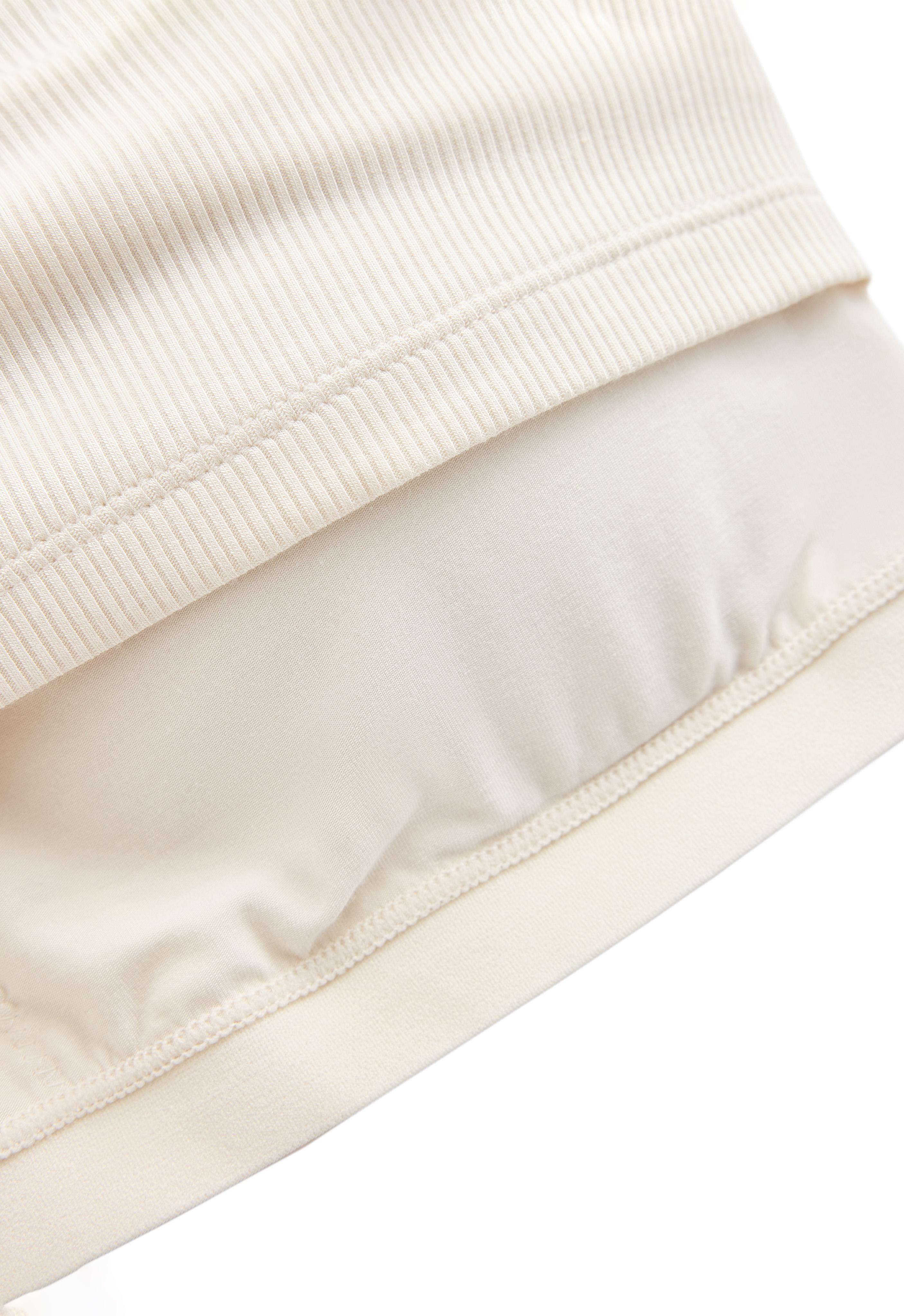 Sleeveless seamless rib tank top with half-zip — PALE ECRU