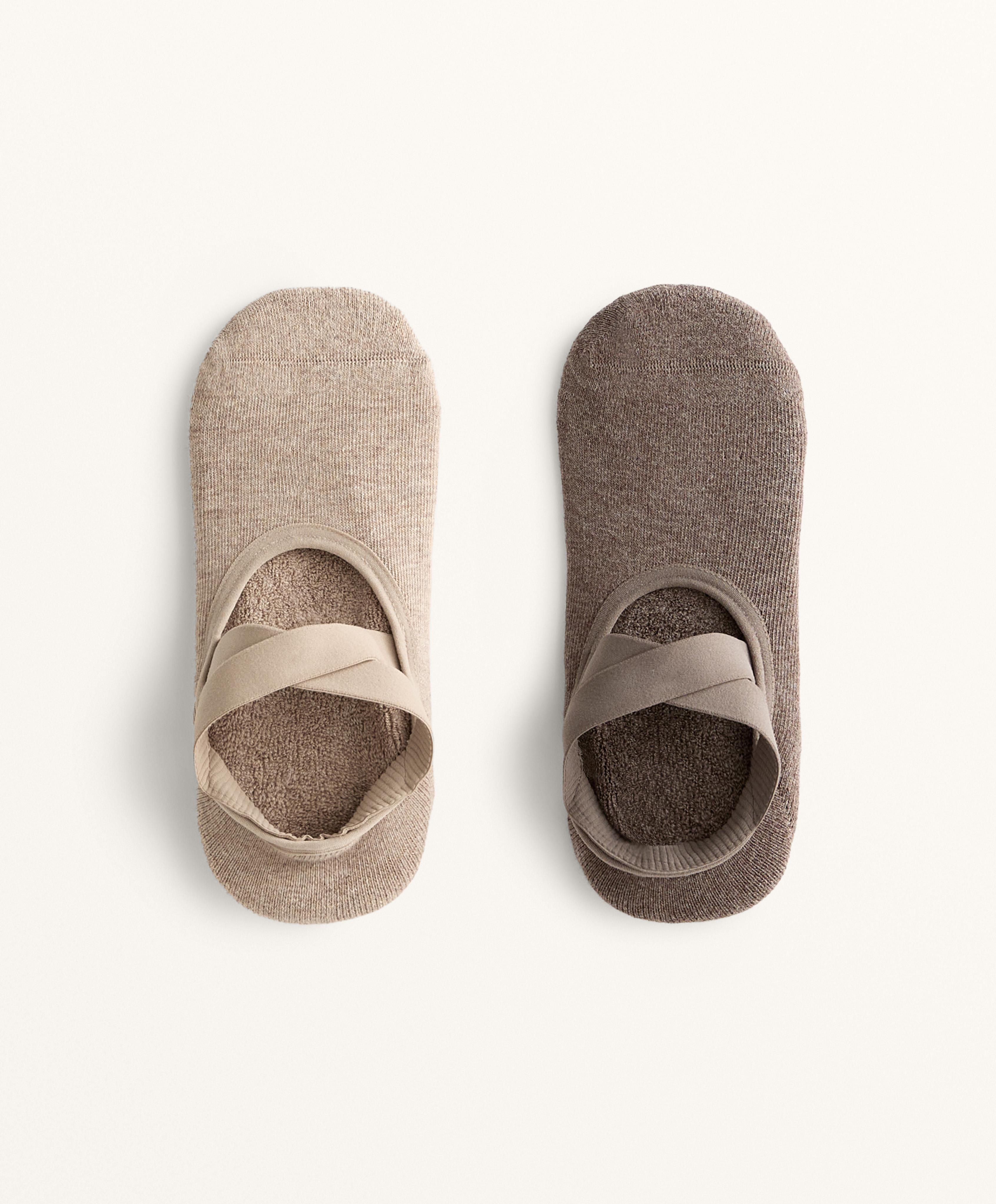 2 pairs of cotton blend yoga and Pilates socks with crossover straps