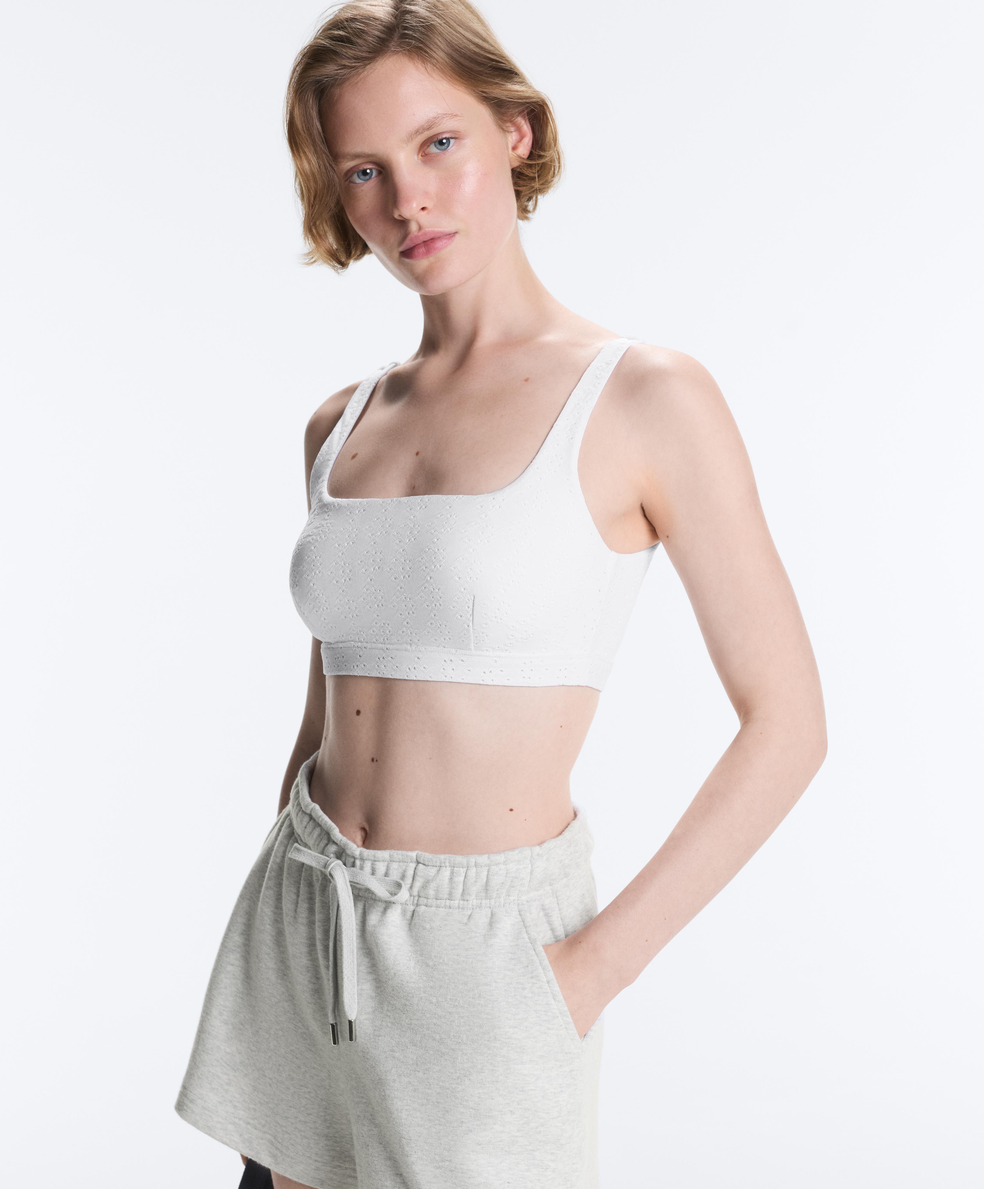 Embroidered medium-support sports bra — WHITE
