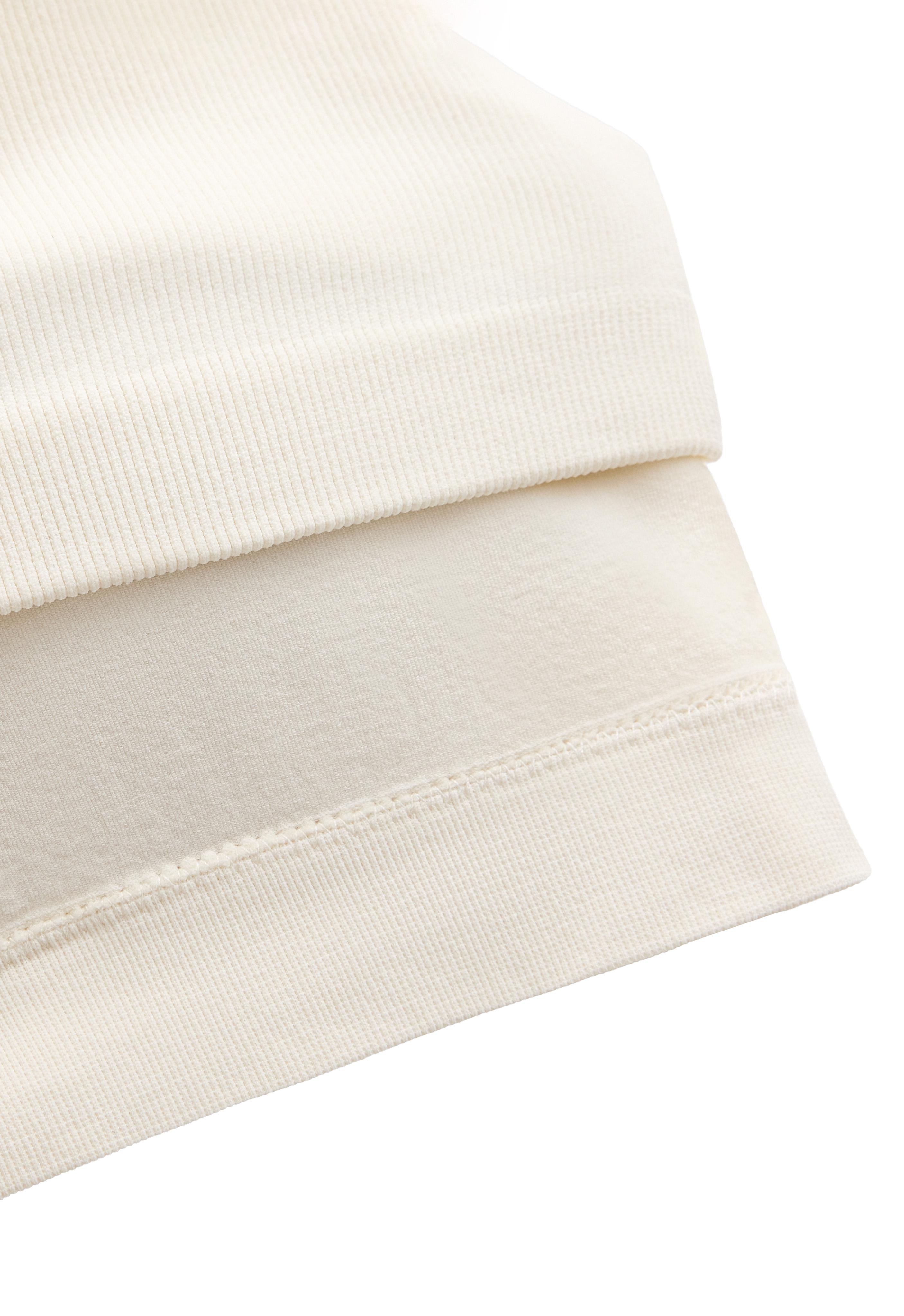 Sleeveless seamless half-zip tank top — PALE ECRU