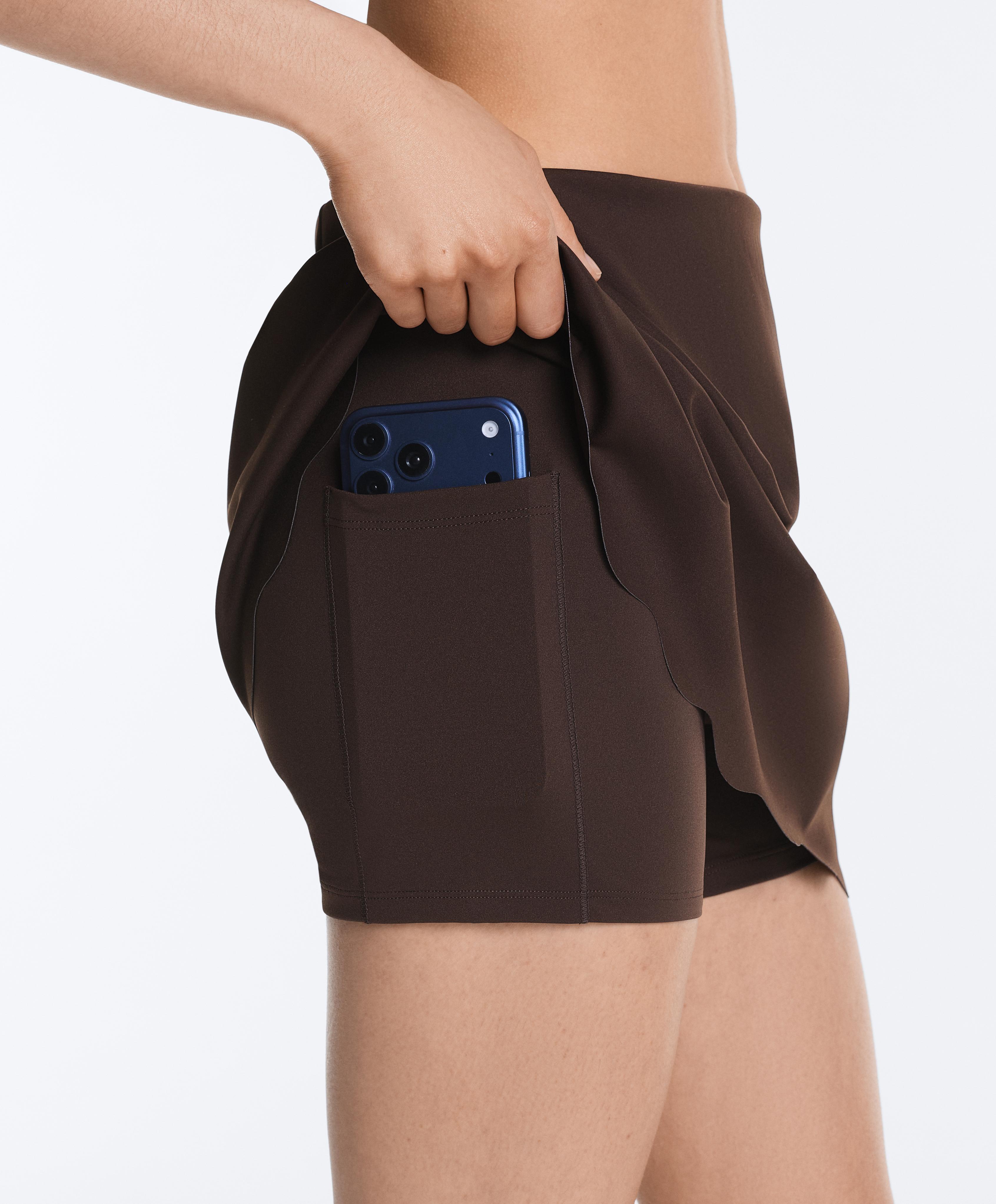Compressive high-rise wavy short skirt — DARK REDDISH‑BROWN