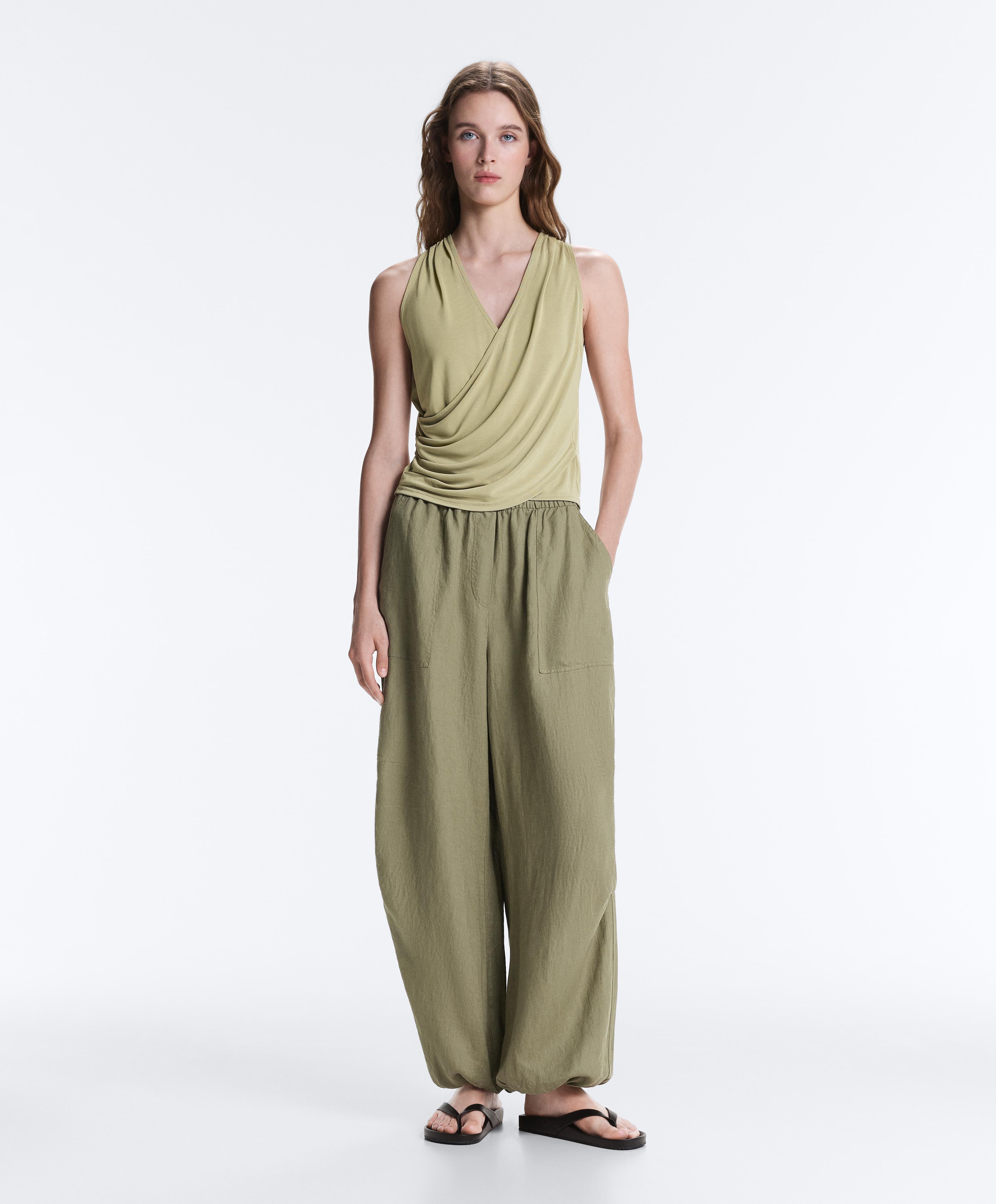 Modal blend sleeveless crossover T-shirt — PALE PISTACHIO