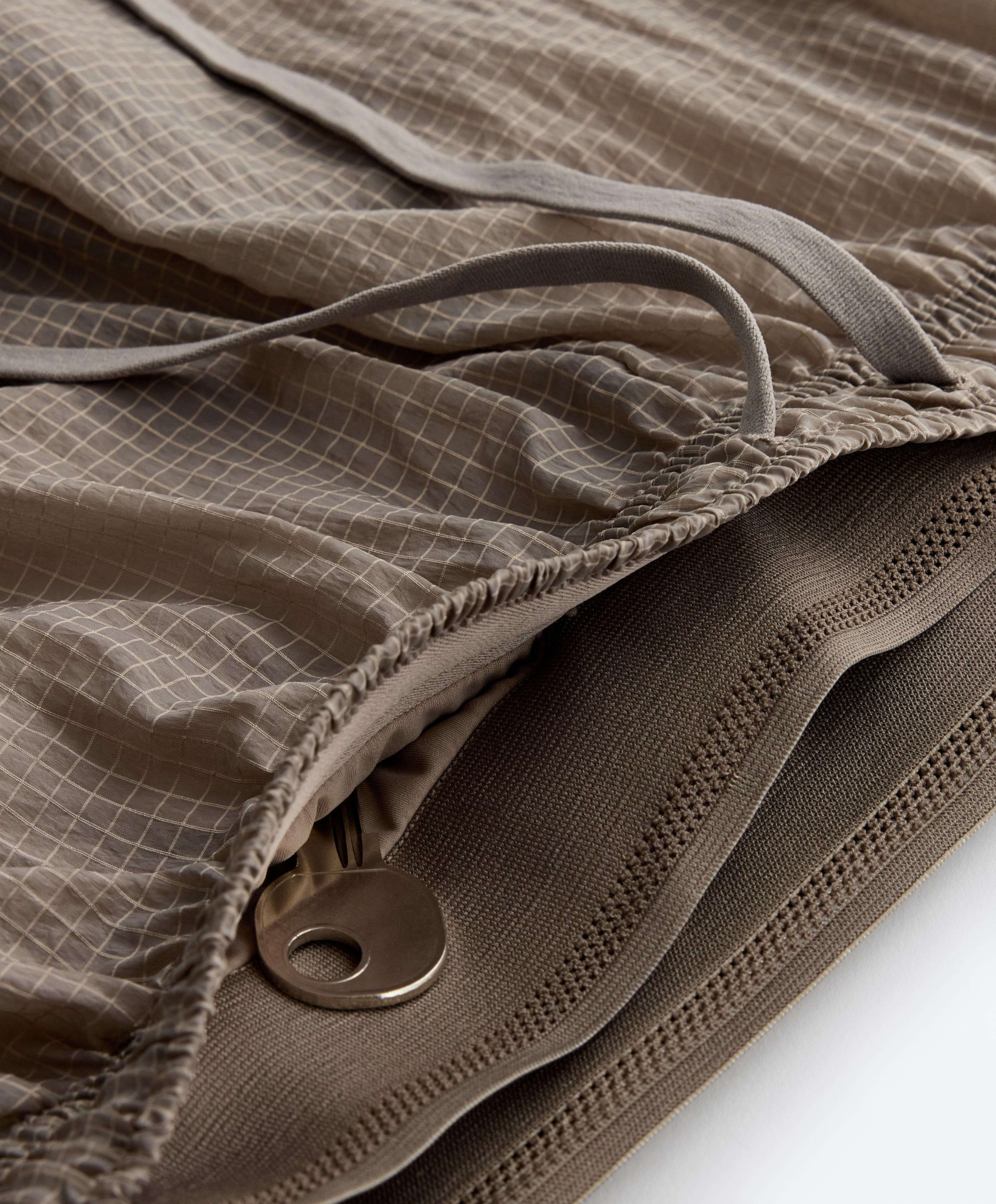 Technical 2-in-1 checked mid-rise shorts — MINK GREY