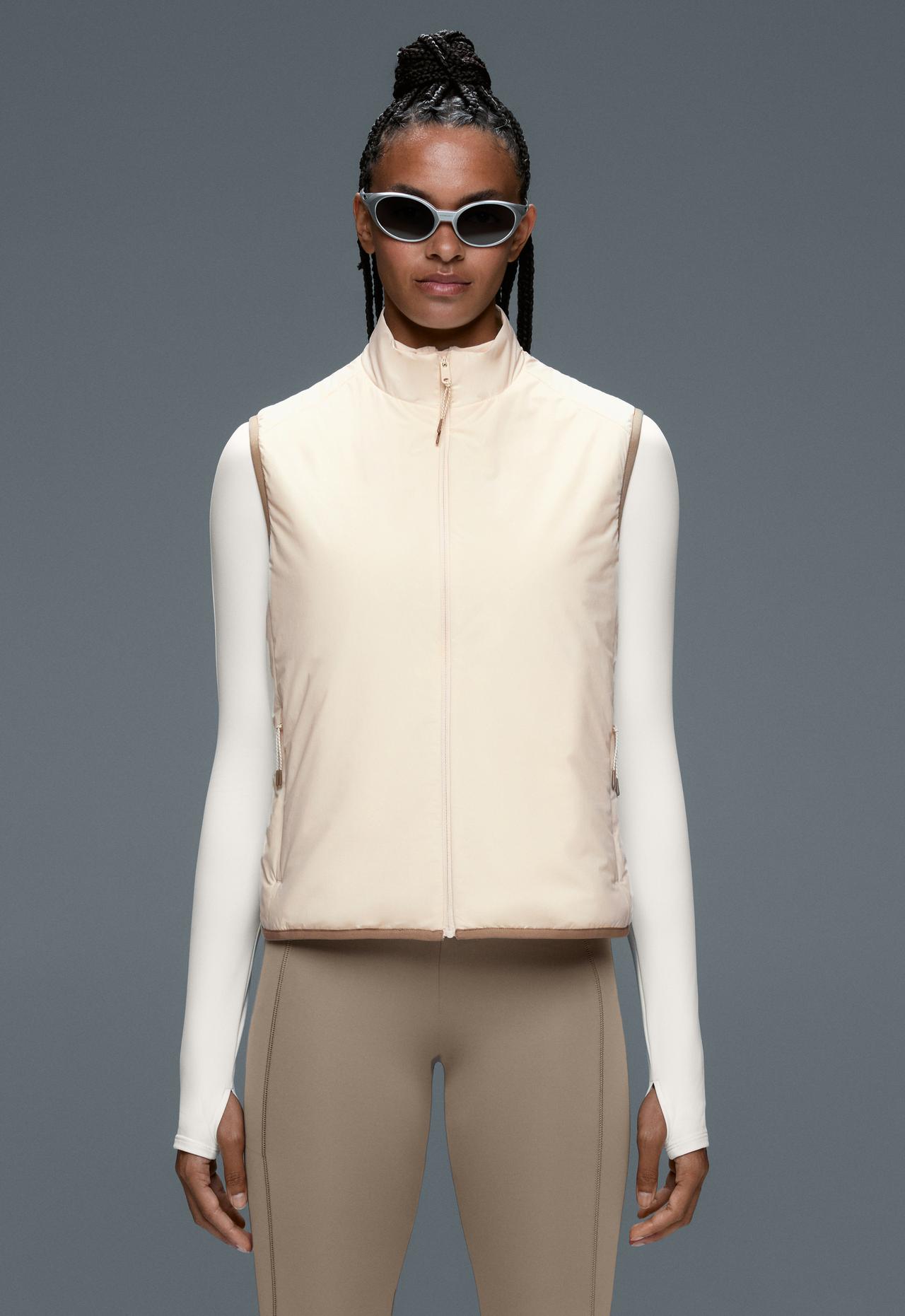 FELLEX® Volcanic technical padded gilet with piping — PALE ECRU