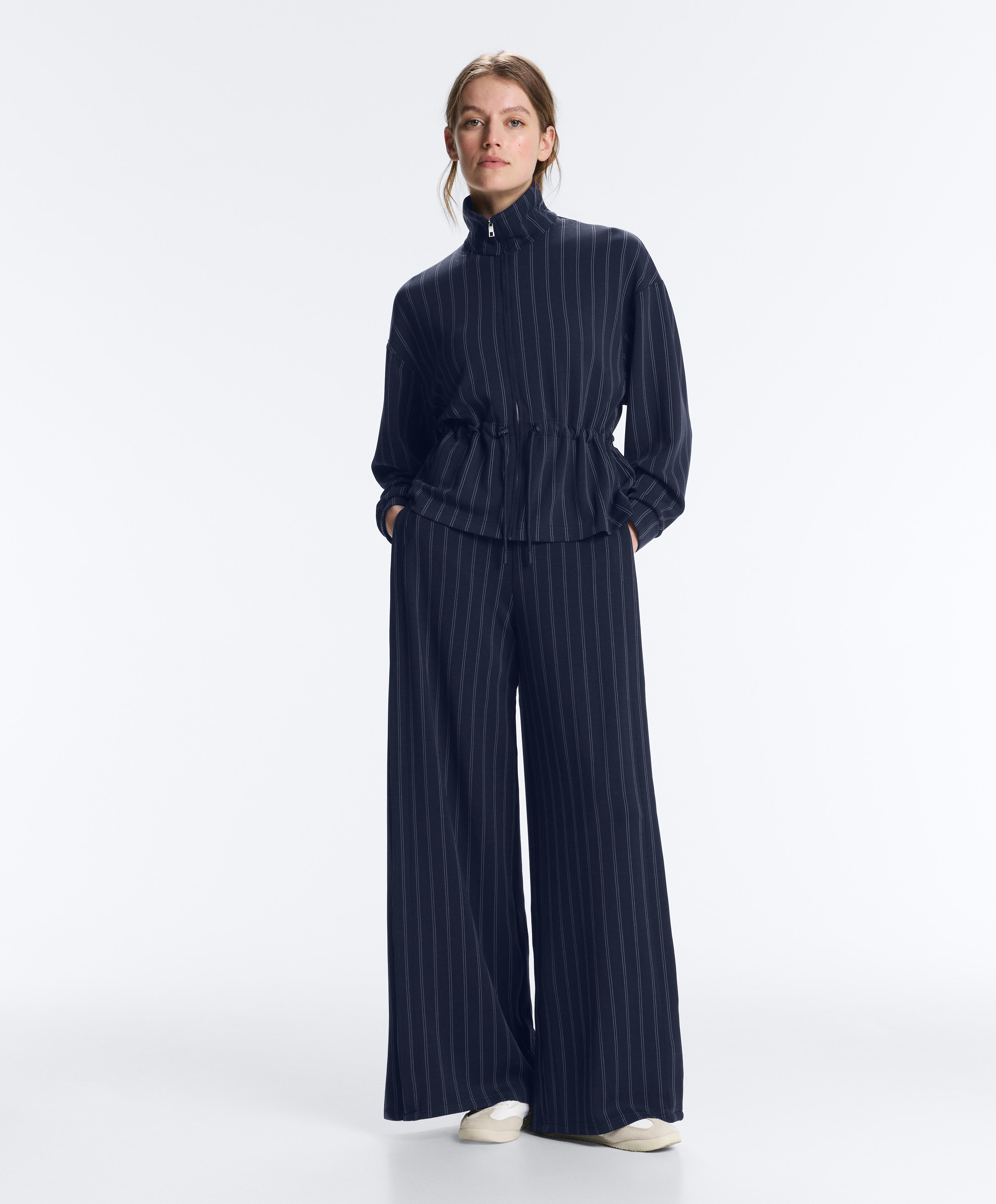 Blue soft-touch modal total look with wide side pleat