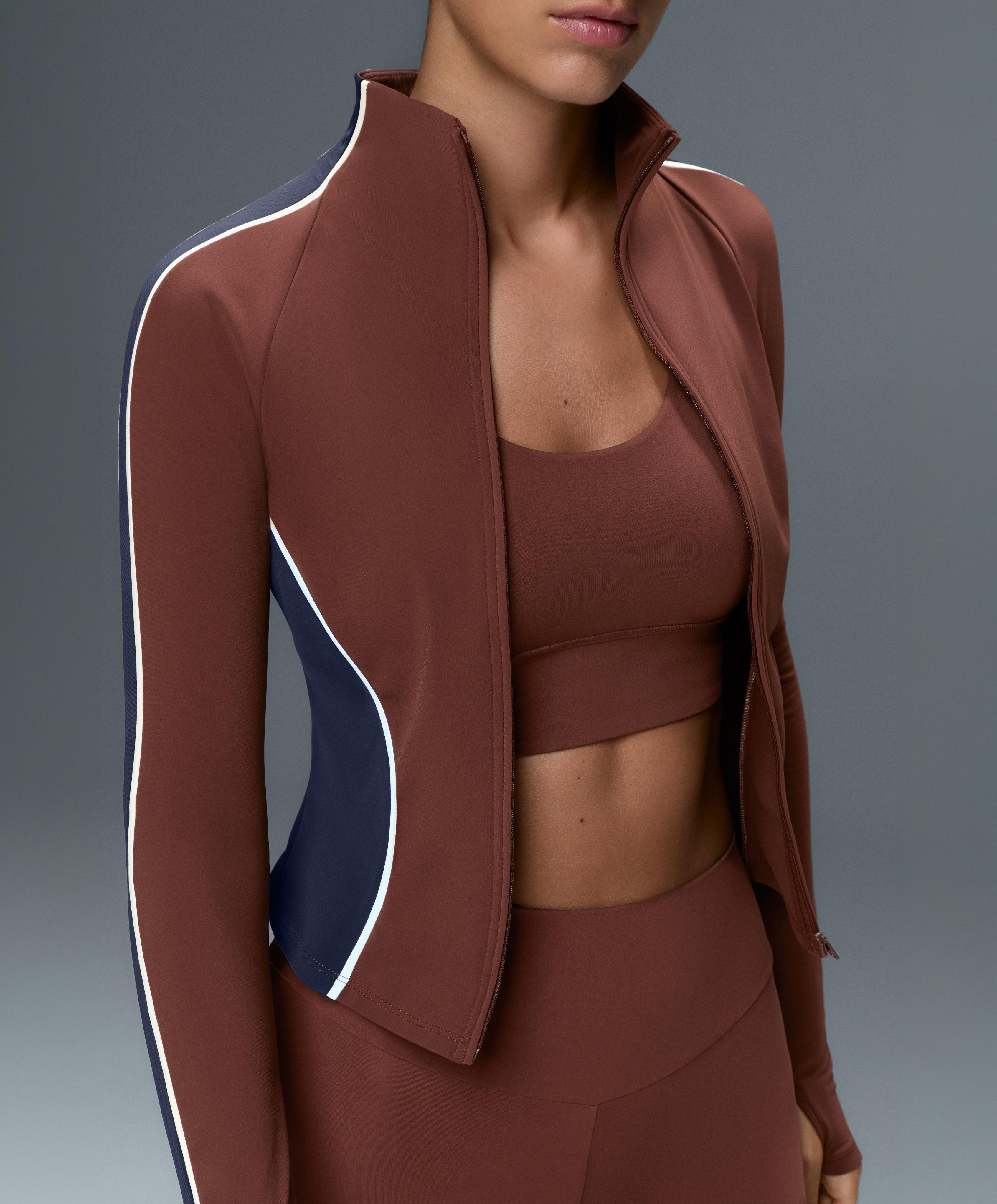 Light warm colour-block technical jacket — TERRACOTTA
