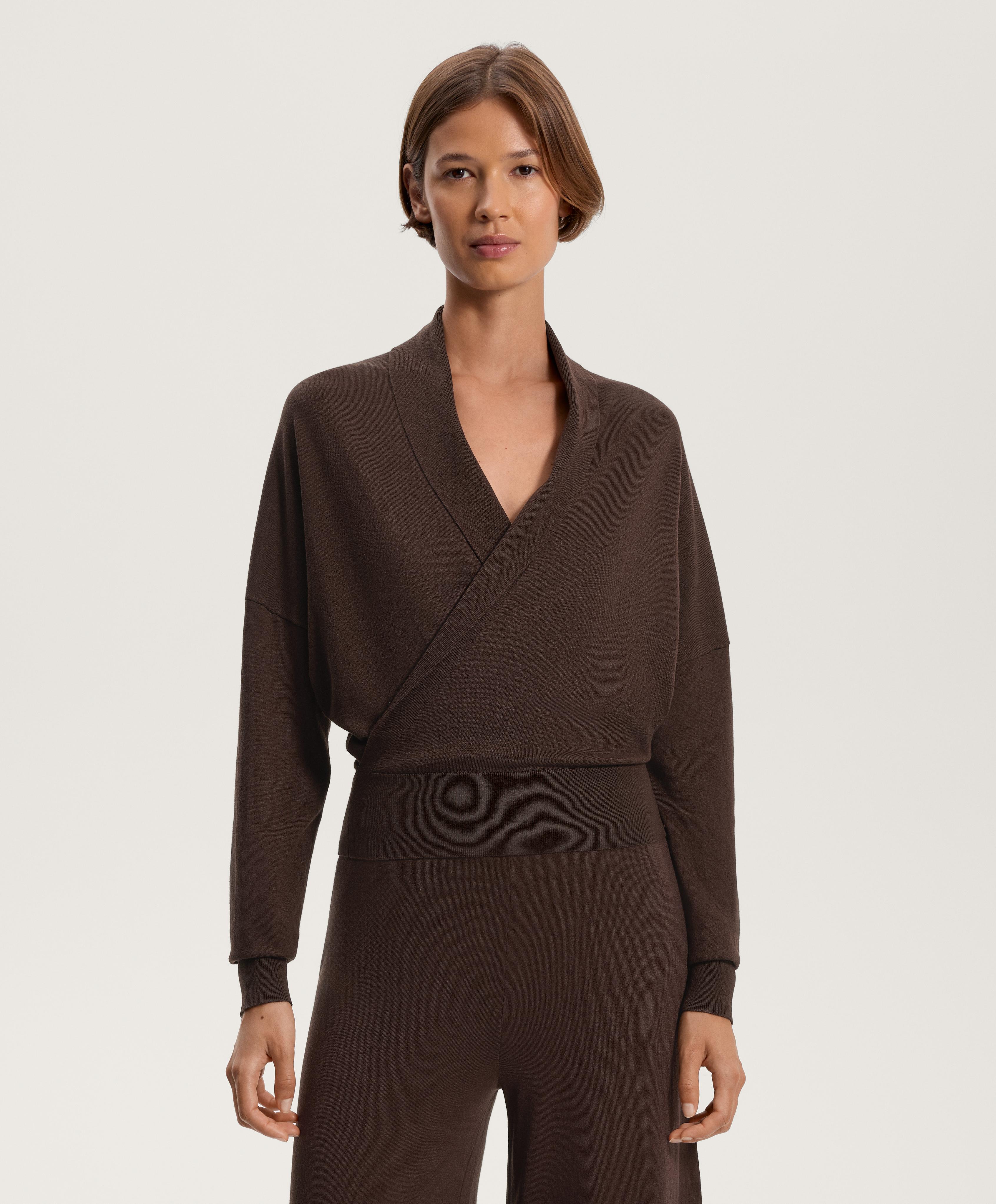 Crossover jumper with fitted waist