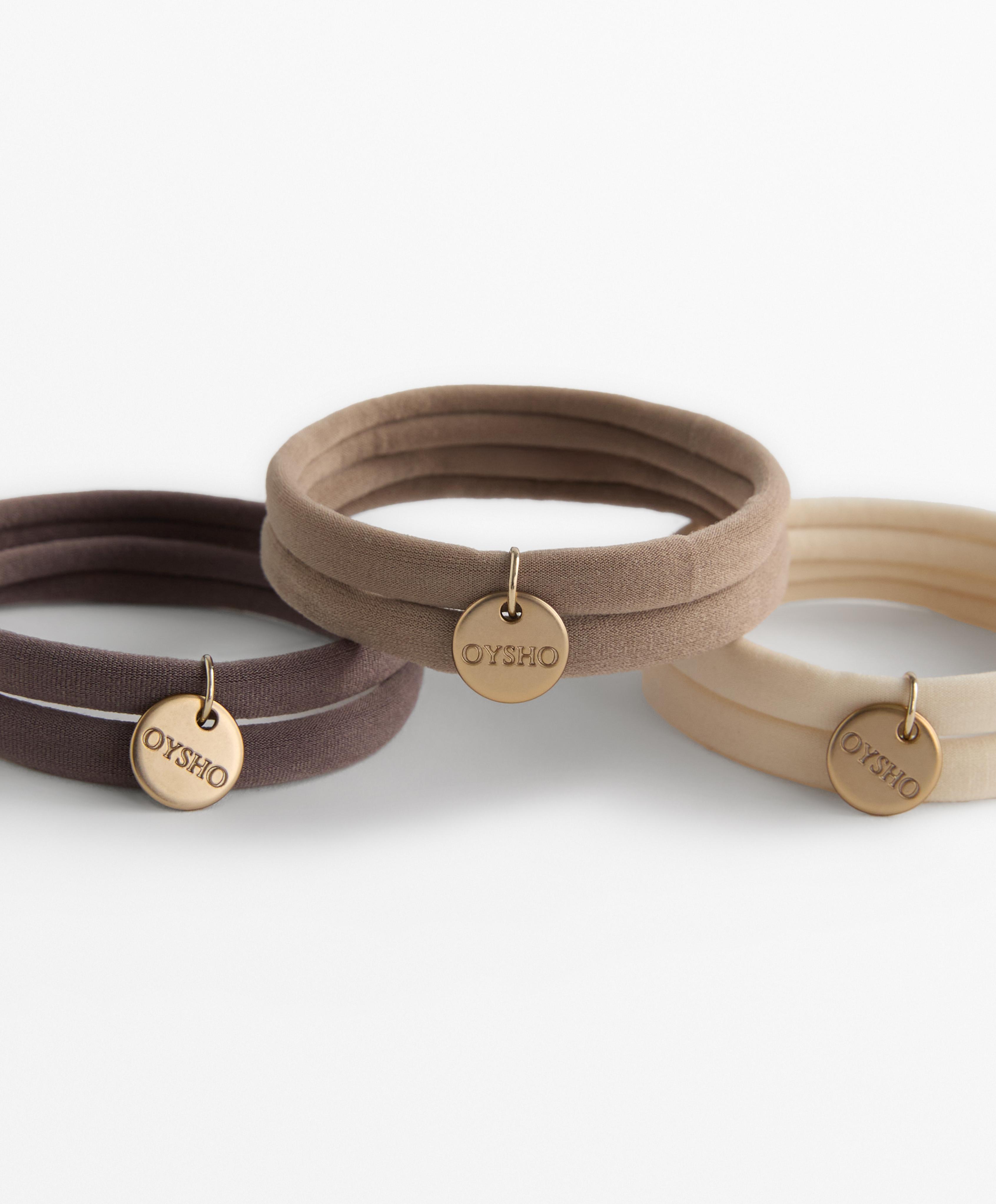 6 Oysho plaque hair ties
