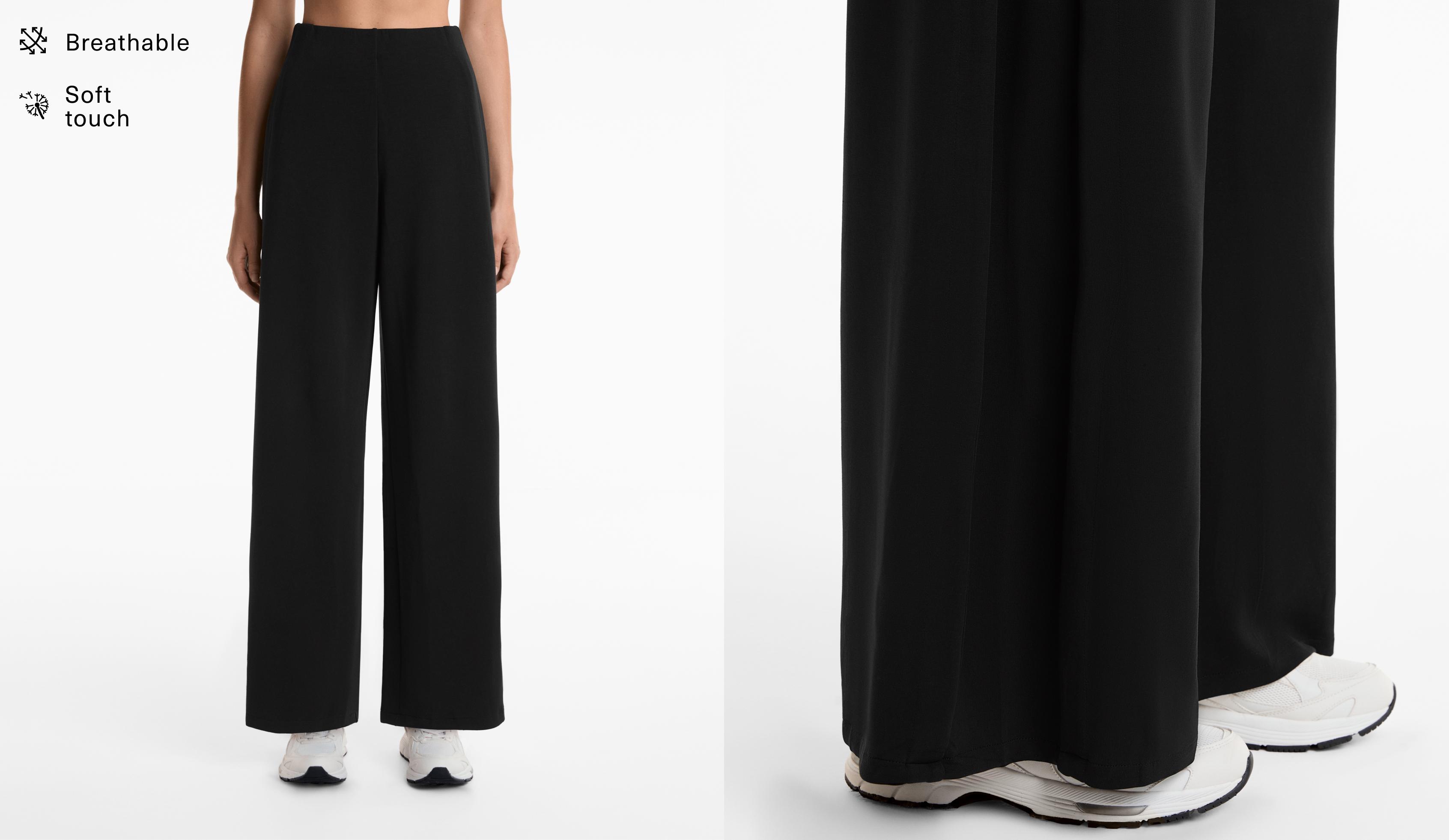 Wide leg side-pleated trousers with soft-touch modal.