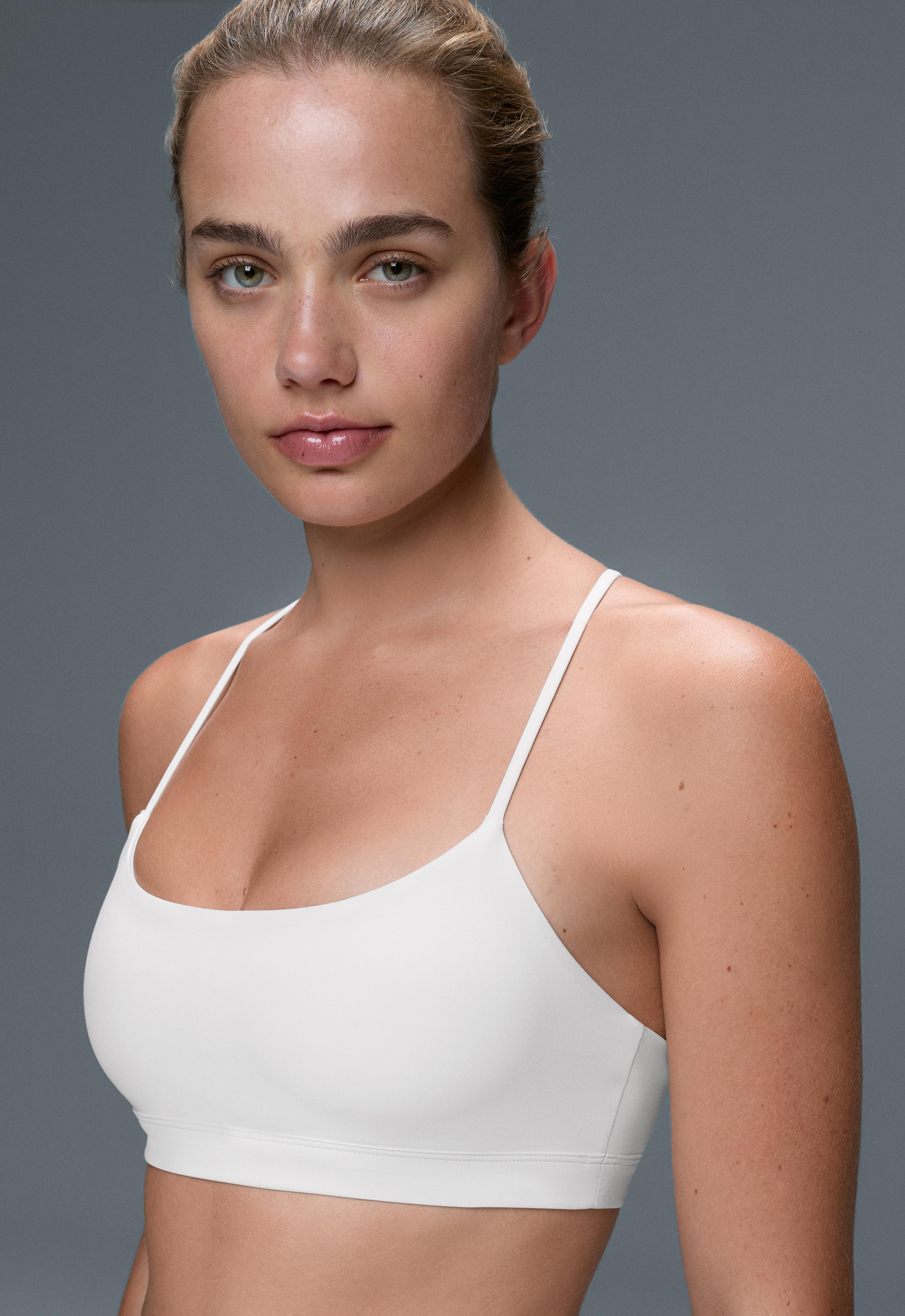 Low-support Comfortlux sports bra with crossover straps — WHITE