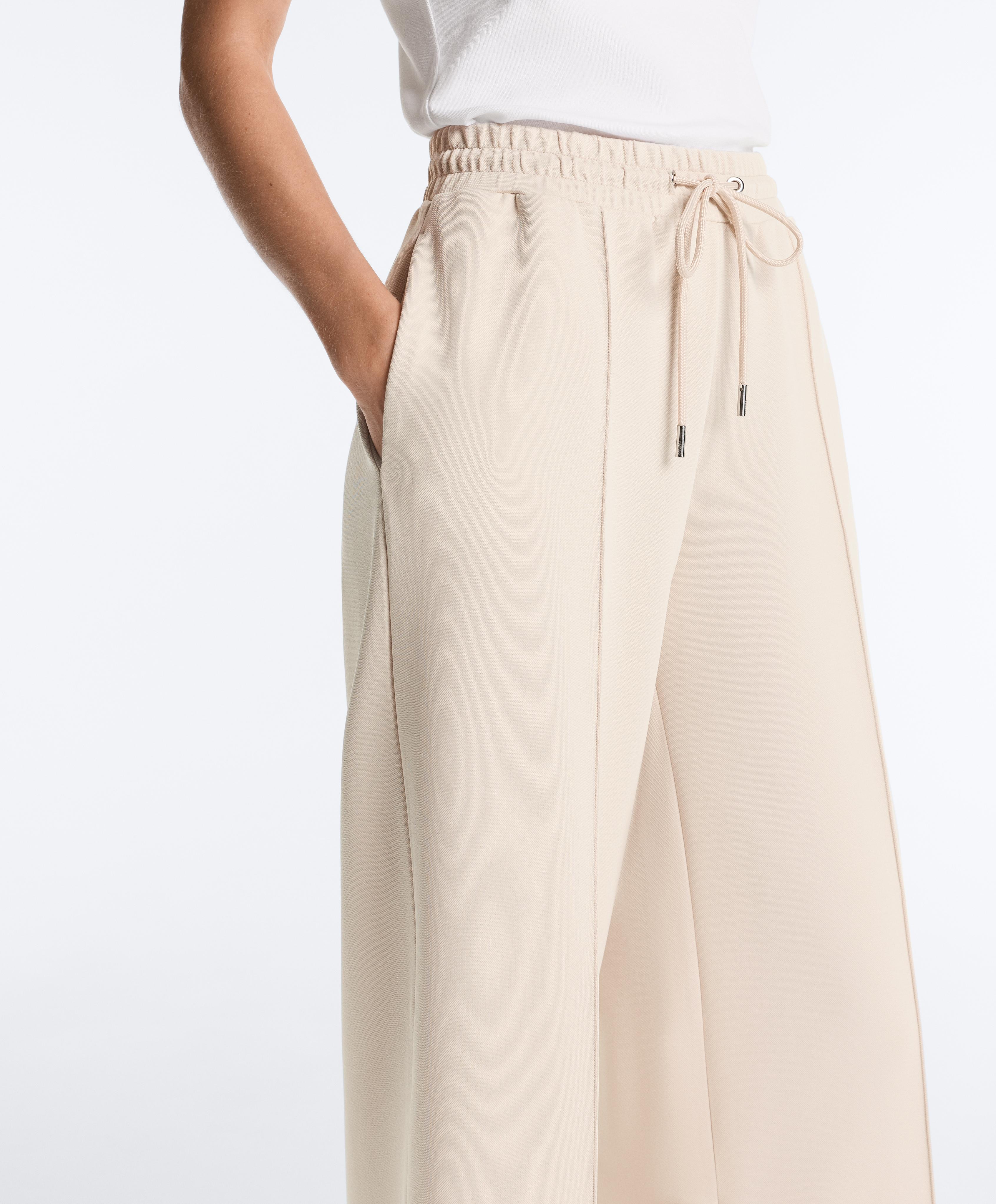 Cotton piqué straight-leg trousers with crease — PALE BEIGE