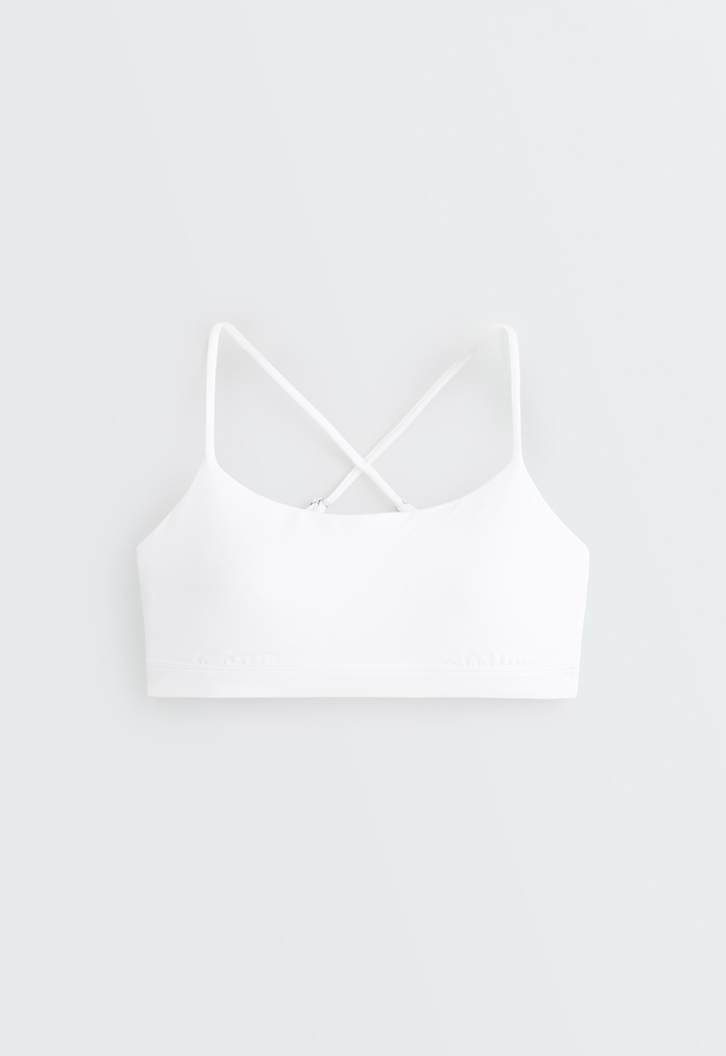 Low-support Comfortlux sports bra with crossover straps — WHITE