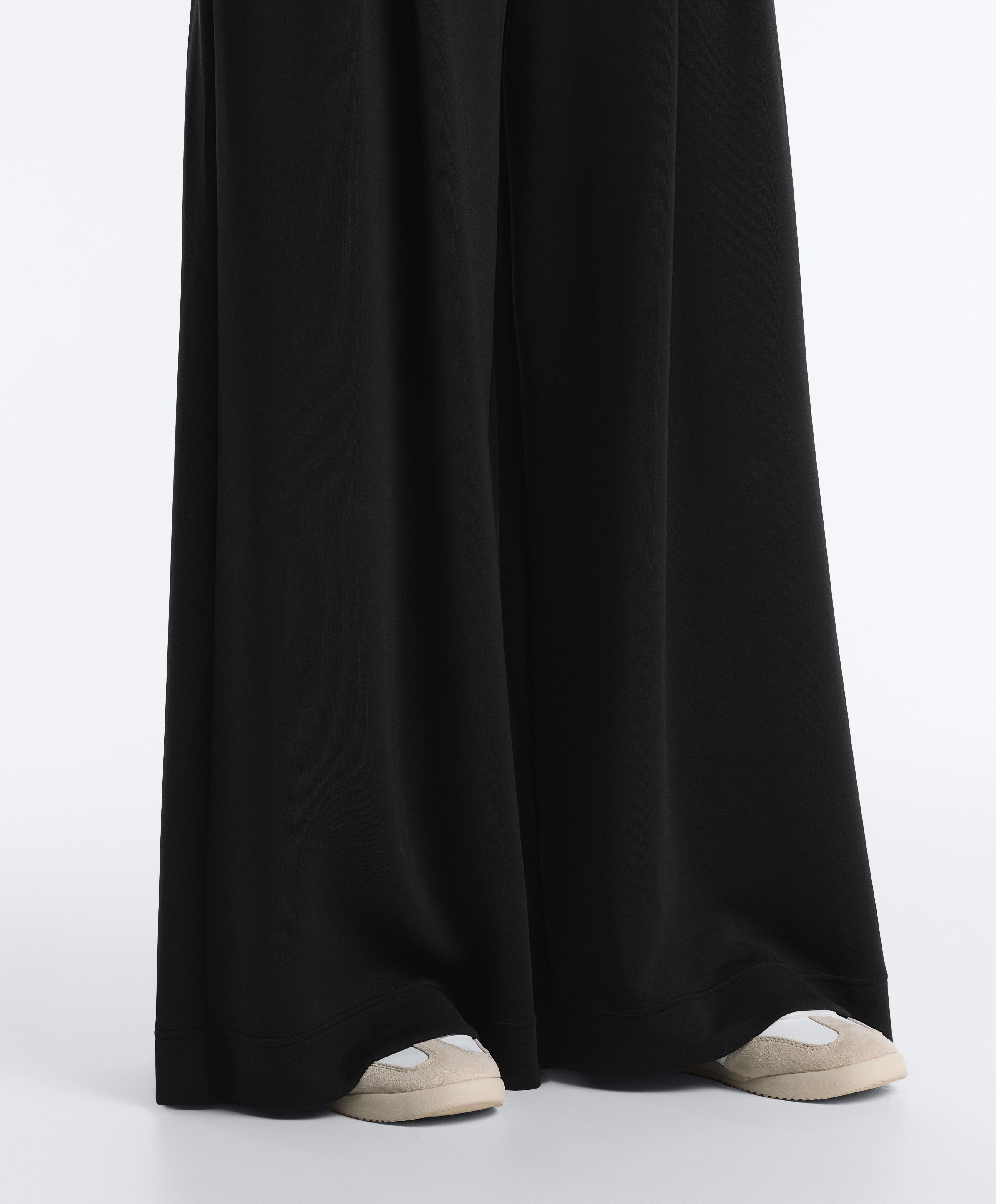 Long wide-leg trousers with soft touch modal and pleats — BLACK