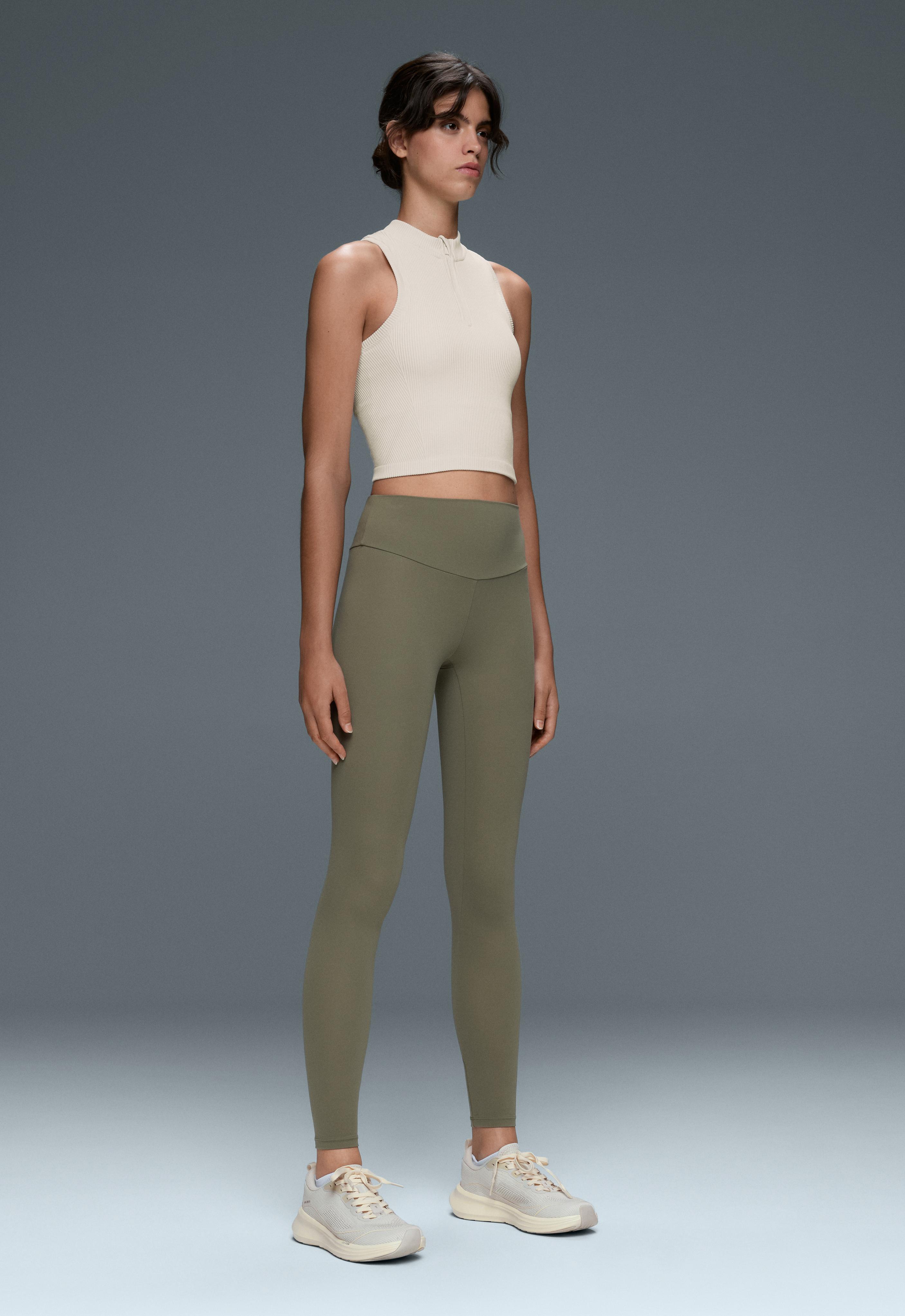 Sleeveless seamless rib tank top with half-zip — PALE ECRU