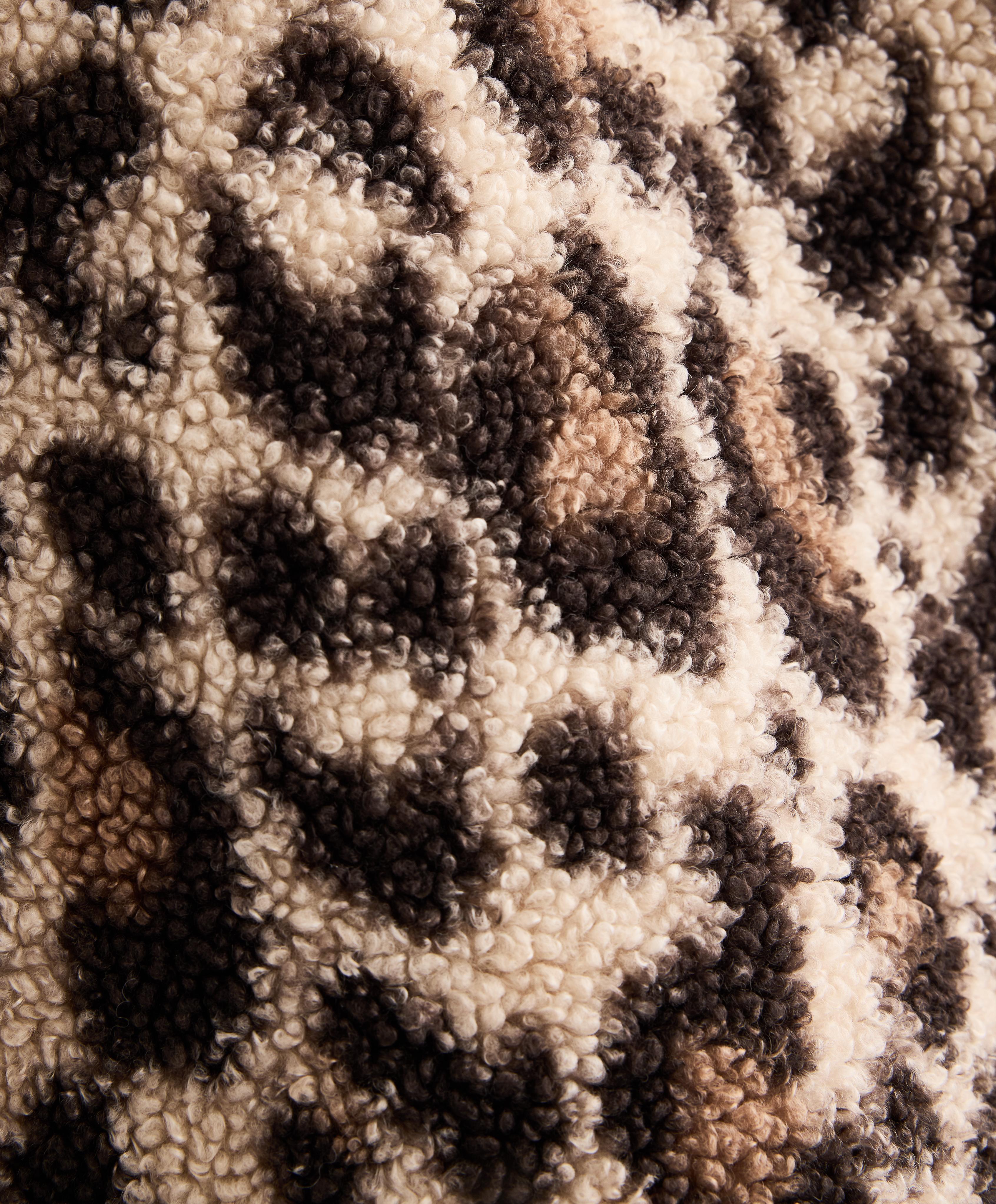 Faux-shearling animal print jacket