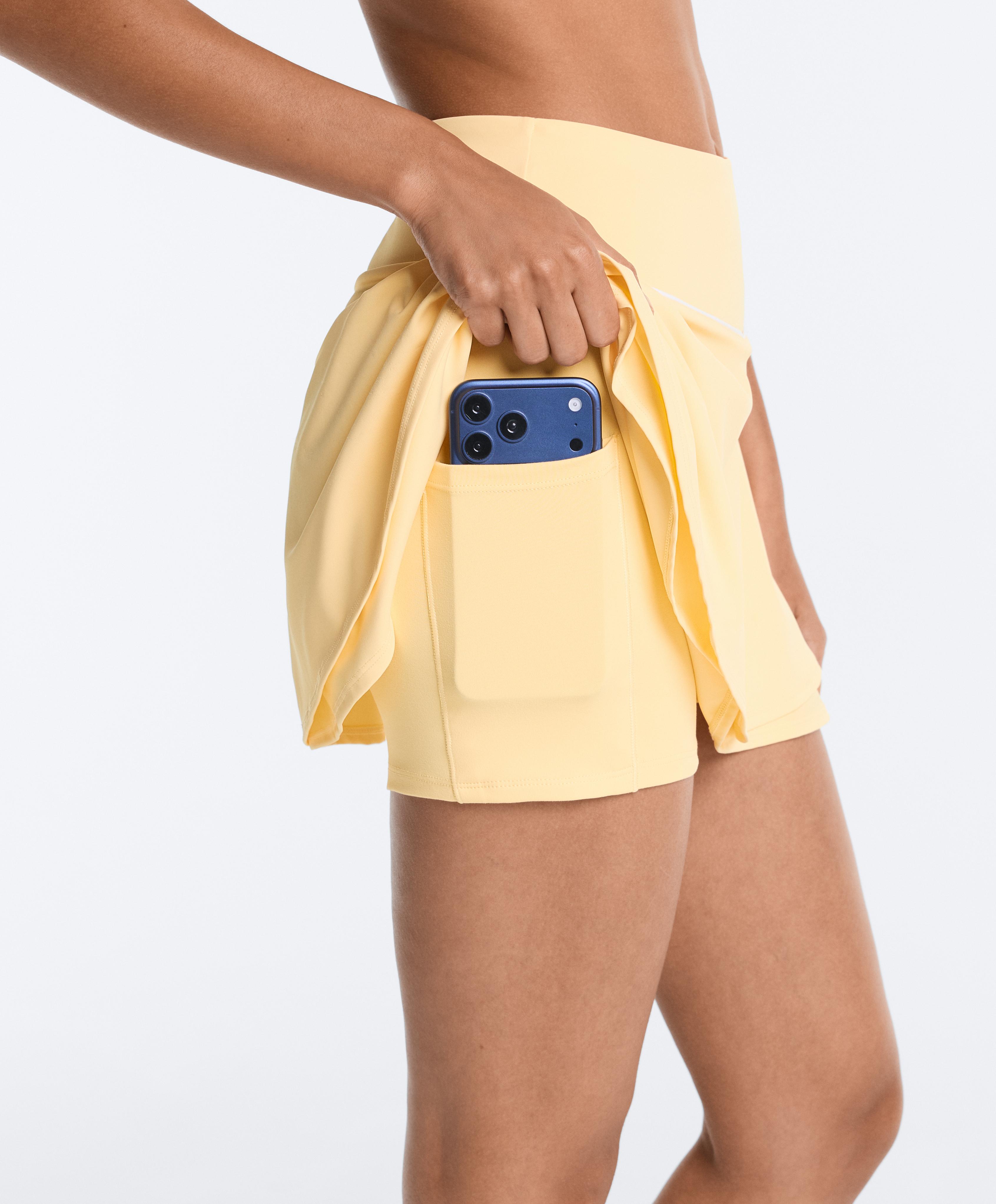 Double layer high rise short skirt — PALE YELLOW
